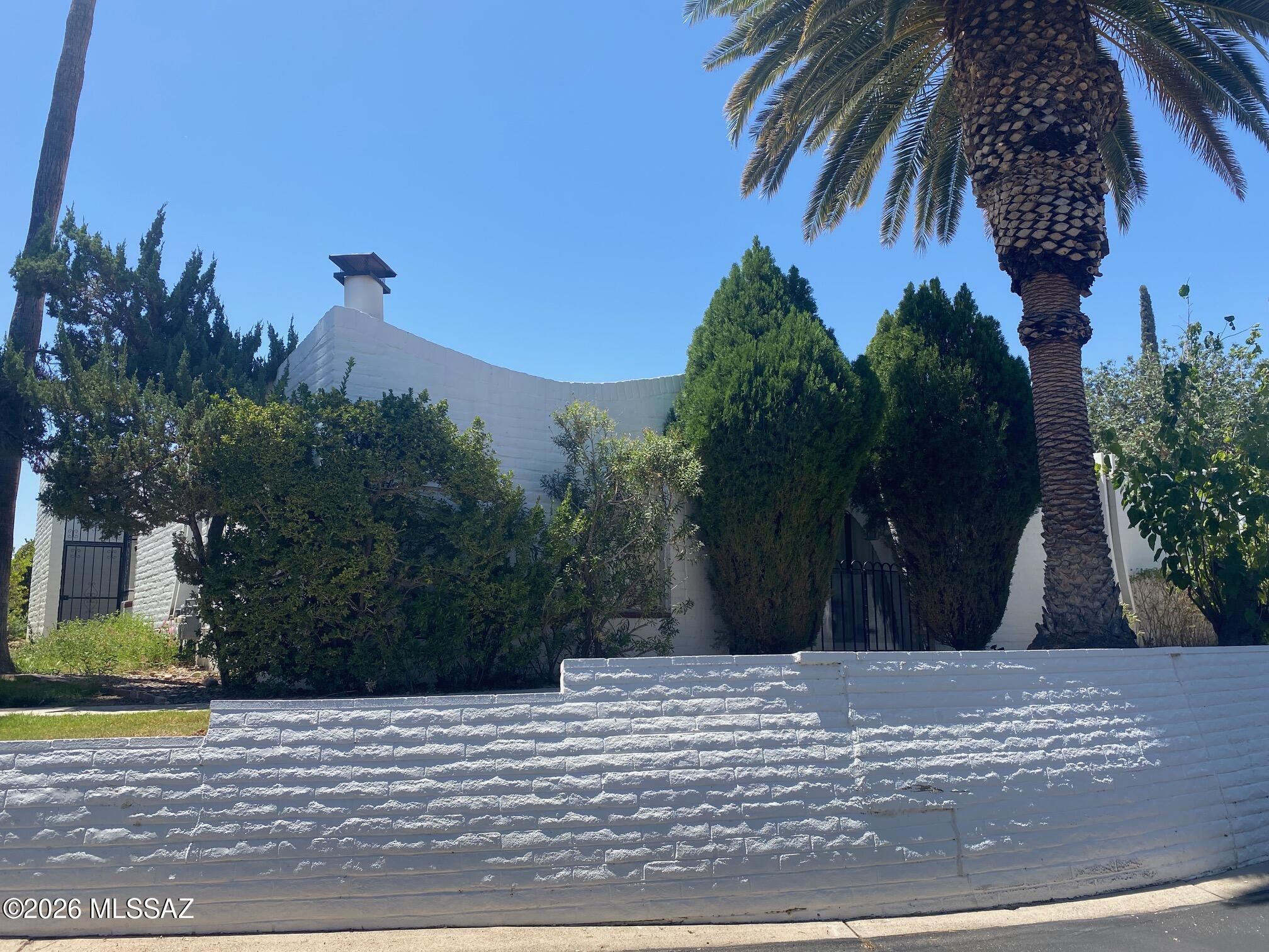 Well card for 2 bedroom/2 bath townhome in 55+community. Saltillo tile throughout. Custom wood shutters, gas fireplace. Front and rear courtyards. I covered parking spot. Pets upon owner approval.