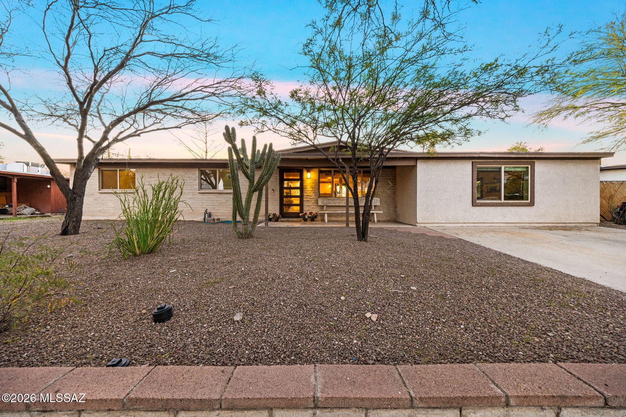 North Tucson gem -- 3 bed, 2 bath single-level home with thoughtful upgrades and an entertainer's backyard. Bright open living spaces flow to a modern kitchen with stainless appliances and ample storage. Primary suite offers privacy and updated bath. Outside, enjoy a built-in grill, cozy fire pit, soothing water feature and low-maintenance turf -- perfect for gatherings. Conveniently located near dining, shopping and parks. Move-in ready and made for Arizona living.