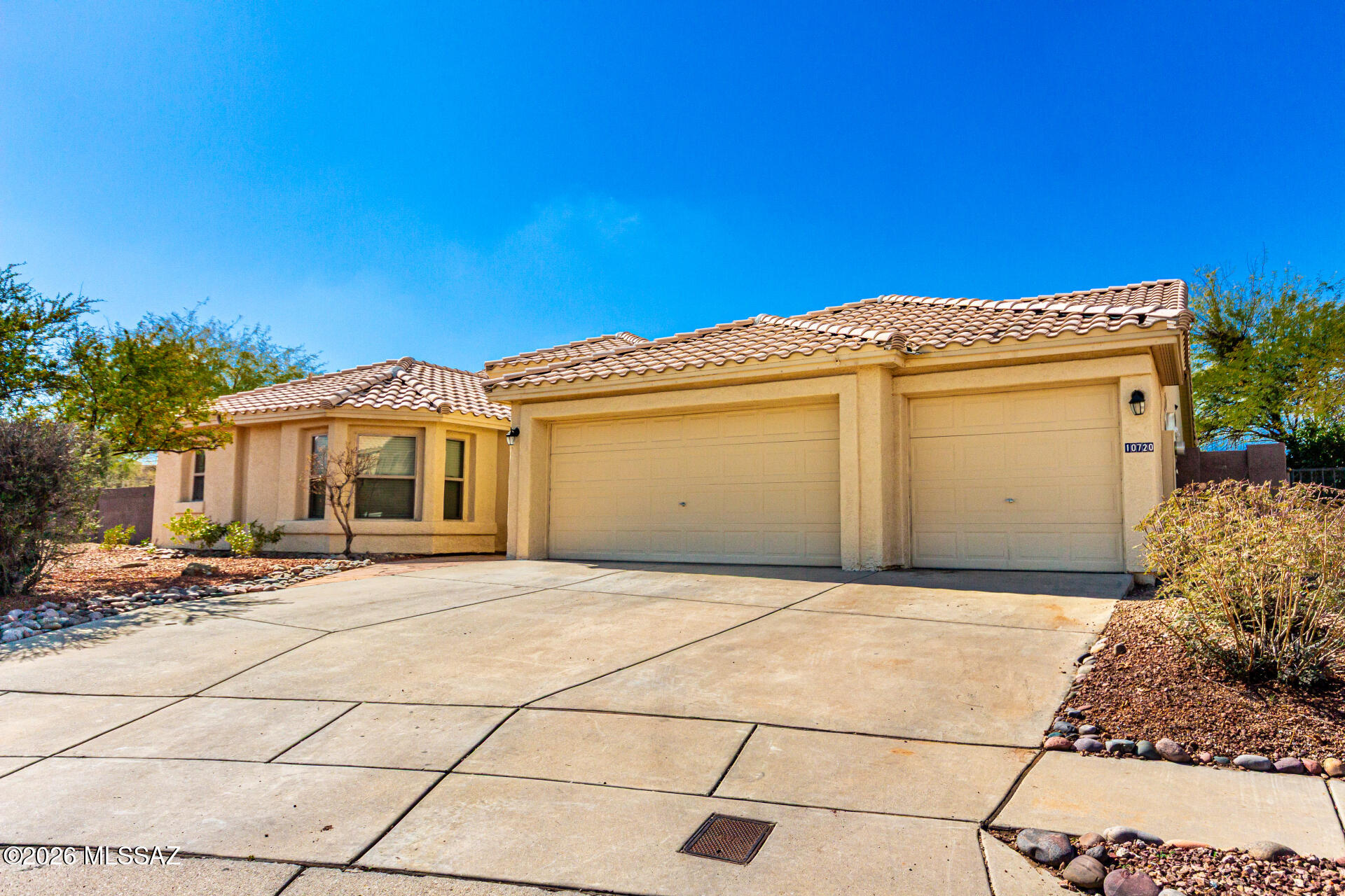 RANGE PRICED: $615,000 - $650,000. Welcome to this beautifully updated gem with a modern feel in the coveted Silverado Hills neighborhood. This single-story home offers 4 bedrooms and 3 full baths set on nearly an acre of land, with no neighbors behind and a 3 car garage. It features a bright, open, split floorplan layout with ceramic wood-look tile throughout the entire house. The heart of the home is the gourmet kitchen with a large granite island, gas range, double ovens, plenty of storage with 42'' cabinets and stainless steel appliances In the backyard you will find plenty of space, citrus trees, turf grass, a large covered patio and an outdoor pizza kitchen. Call to tour this home today!