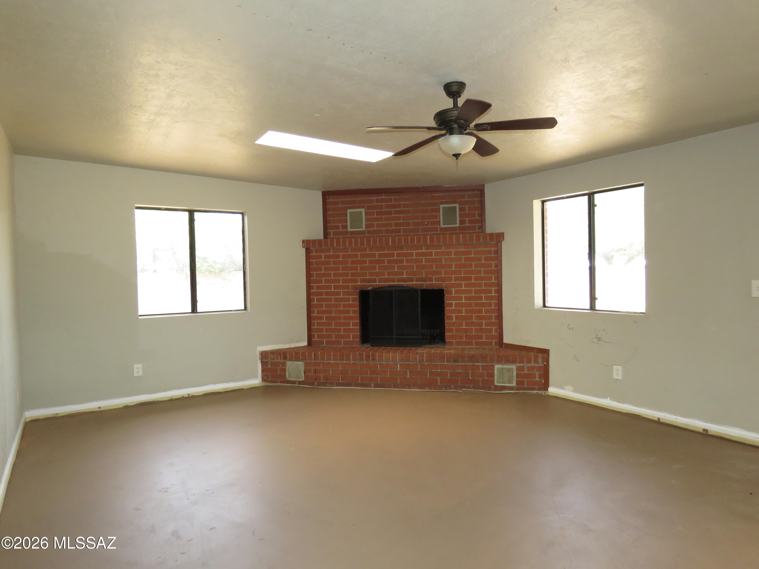 Bring your tools and your imagination to this charming red brick home offering 1,761 sq. ft. with 3 bedrooms, 2 full bathrooms & a huge bonus room full of possibilities!
The great room features an open-concept layout flowing into the kitchen and breakfast area, highlighted by a granite center island perfect for entertaining. The spacious living room includes a cozy wood-burning fireplace and a wet bar with a granite countertop & sink.The bonus room includes its own AC unit &private exterior entrance, making it ideal for a home office, game room, gym, or guest space.
Enjoy a private HUGE backyard with a mountain views, no adjacent rear neighbors, plenty of room to create your own outdoor retreat. HVAC 3 Years APX, Solar 2021. Close to DMAFB, TIA, malls and shopping center. Supplement Remarks (10,000 characters max)