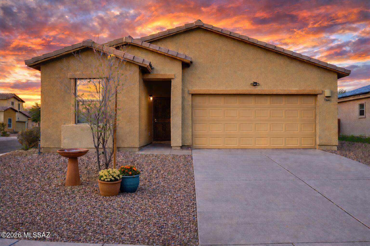 Range pricing: Seller to counter or accept offers between $274,900 - $299,900. Welcome to 12084 W Makenna Lane - a thoughtfully maintained 3-bedroom, 2-bath home set on a spacious corner lot in a location that truly delivers. The name Makenna is often associated with warmth and a spark of energy- a fitting reflection of the inviting feel this home offers from the moment you arrive. Fresh interior paint and tile flooring throughout create a clean, cohesive foundation, while the layout is practical and easy to live in. A new dishwasher will be installed, and security doors on both the front and back add everyday peace of mind. The corner lot provides added space and flexibility outdoors, giving you room to relax or entertain. Inside, the home feels comfortable and intentional - well maintained, easy to live in, and welcoming in that "this just feels right" kind of way. Located near trails, parks, the new Fry's Marketplace, the Marana Aquatic & Recreation Center, and with easy I-10 access, this home blends convenience with lifestyle. If you've been looking for a home that feels inviting, comfortable, and well positioned, this is one you'll want to see in person. Come take a look at Makenna Lane and imagine what everyday life could look like here.