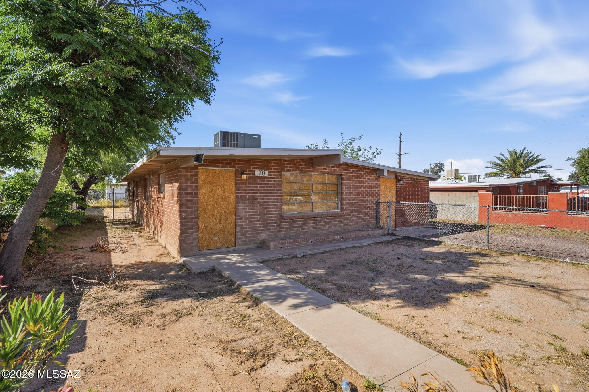 Investor opportunity in Tucson with strong upside potential. Solid block construction on a spacious lot with existing slab and detached structure. Property is in need of renovation and priced accordingly. Ideal for fix-and-flip, rental hold, or redevelopment. No HOA. Convenient access to I-10, major employers, and Tucson International Airport. Bring your vision and contractor.
