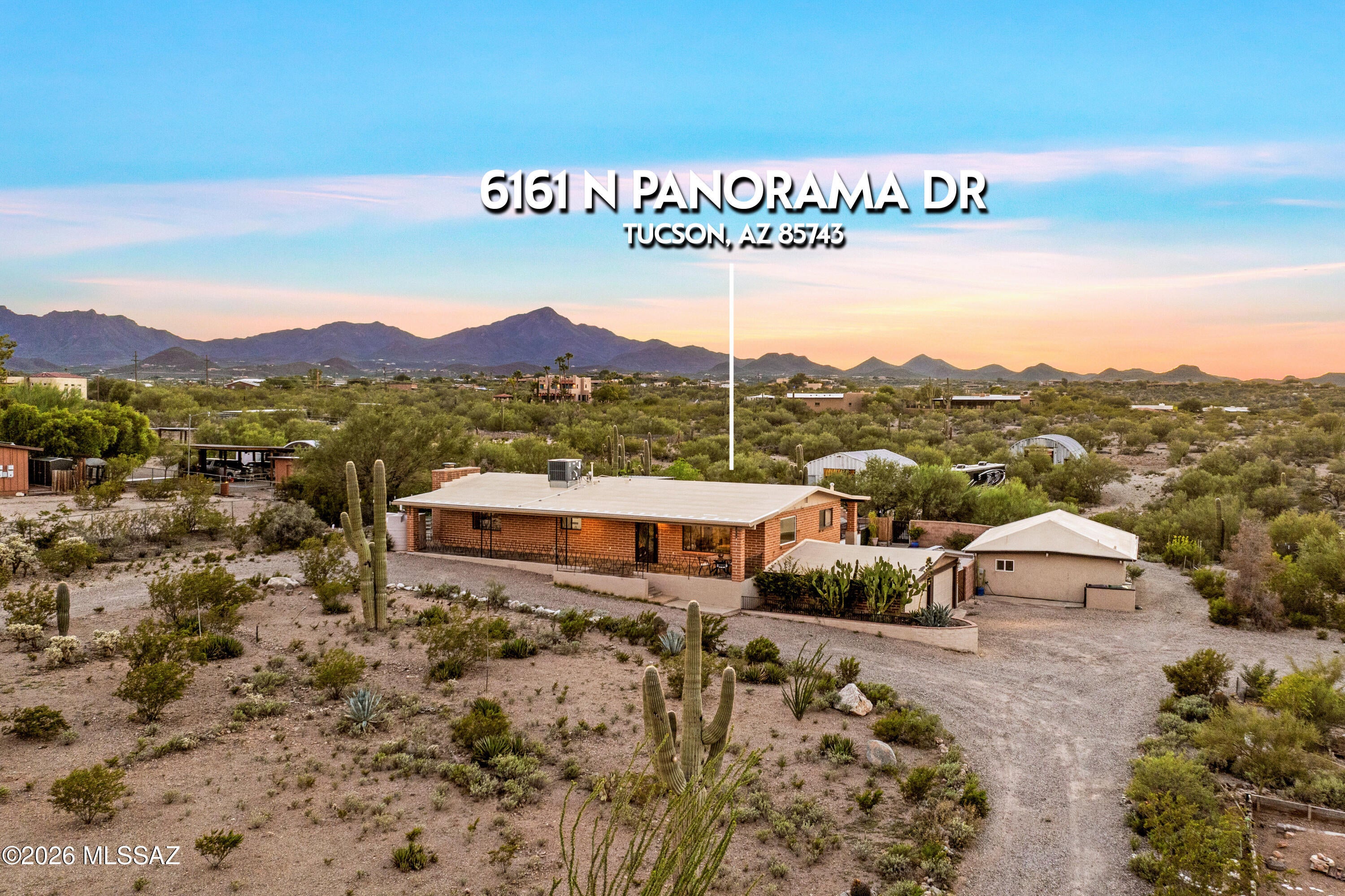 Your UNICORN home is now available! Perched on an elevated 3.47 acre lot, the 360-degree views are amazing! Multiple living spaces for extended family (or?) include:  Main home with spacious primary, remodeled ensuite, large secondary bedrm w/ remodeled bath across the hall. Remodeled kitchen w/ quartz counters, farmhouse sink, SS frig, wall oven & micro. Family room has amazing city lights/mountain views. Separate dining room includes brick dry bar w/ seating and is adjacent to the office w/ built-in desk and shelving. All floors are newer LVP: no carpet here! The lower level can be accessed by a spiral staircase and also has 2 ext doors to patio and garage. This living space is a perfect MIL suite: bedroom, full bath, great room w/ full kitchen and views of the pool and patio. Continued Step outside to yet another living space: A one bed one bath casita w/ kitchen and living room. Outside is where the FUN starts. Solar heated pool w/ newer pebbletec surface. Multi-level patio with ramada. Raised garden beds and chicken coop behind the gate. Two 1500 and one 1200 water catchment tanks. Cross over the first bridge to the first outbuilding (32x39 feet) which houses a basketball net and storage. Go over the second bridge to the second outbuilding (30x50 feet) which is set up as a fabulous cross-fit gym. Both of these outbuildings can be used for cars, RVs, workshop, etc., and have both electricity and water service. This UNICORN, multi-gen living situation is rarely available! See document tab for more upgrades and features! Call for an appointment to see it today!