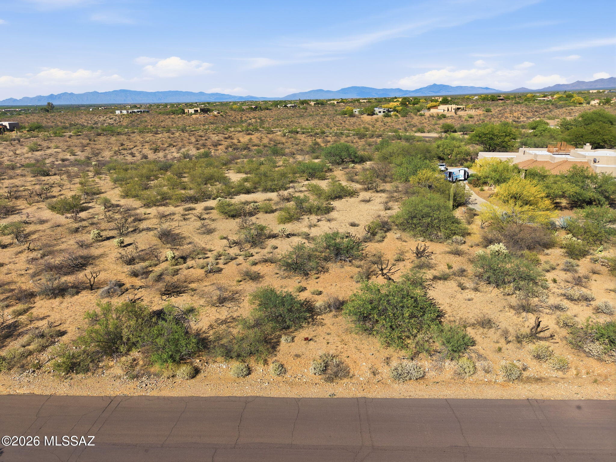 Tucked within the prestigious gated community of Madera Foothills Estates, Lot 7 offers the perfect balance of space, privacy, and breathtaking desert beauty. Spanning 2.03 acres, this homesite captures wide-open panoramic views, with the Santa Rita Mountains standing proudly in the distance--creating a stunning backdrop for your future home. With just the right amount of acreage, you have the flexibility to design a custom home that takes full advantage of the surrounding landscape--whether it's orienting for sunrise views, shaded outdoor living, or simply enjoying the peace and quiet of the desert. Utilities are already available at the property, including gas, electric, and water provided by Global Water Resources--no well required--making the path to building more convenient. A septic system will need to be installed by the buyer. Optional GVR membership is also available, offering access to a variety of recreational amenities.

This is more than just a homesite--it's an opportunity to create your own desert sanctuary. Bring your vision to life and make Lot 7 the place where it all begins.