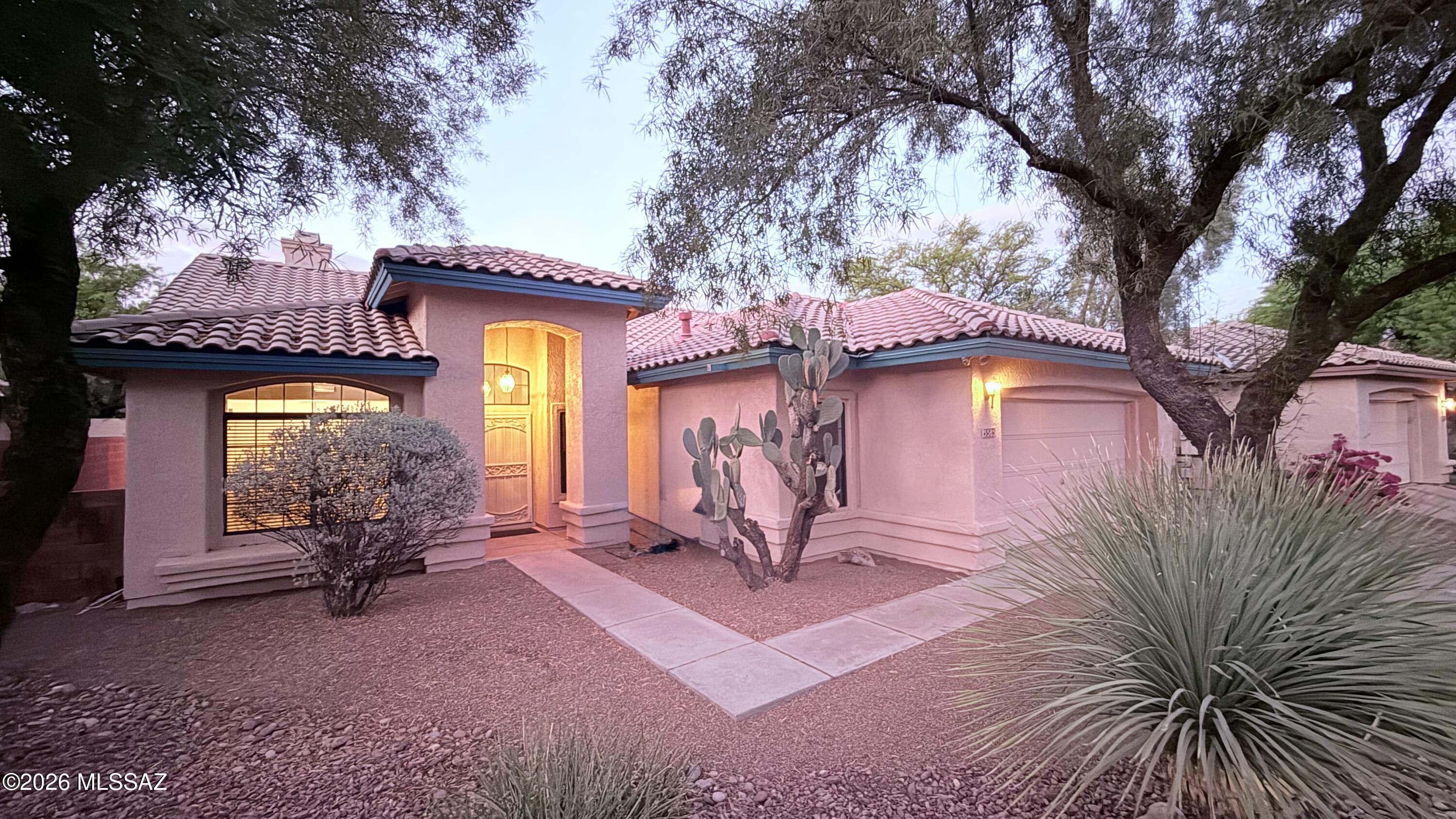 This beautiful home located in Catalina foothills. Great school district.  this exquisite single-level home offers 3 BR/2BA w/ 2,093 sqft. of elegant living space. Quiet Cul-de-sac,N/S Exp. As you enter, you are welcomed into a spacious Living Room and Formal Dinning Area and well-cared-for home. Vaulted ceilings and tall windows bring natural light to brighten up any room. This home features an open kitchen with granite counters and stainless appliances. Spacious Kitchen with island and bar and a Spacious breakfast area. Lovely Fireplace in Family room.  Lovely backyard with Covered patio and a fenced sparkling Pool with Mountain Views.   The house near the natural beauty of Sabino Canyon, you'll have easy access to luxury resorts, fine dining, and award-winning schools. A must see.