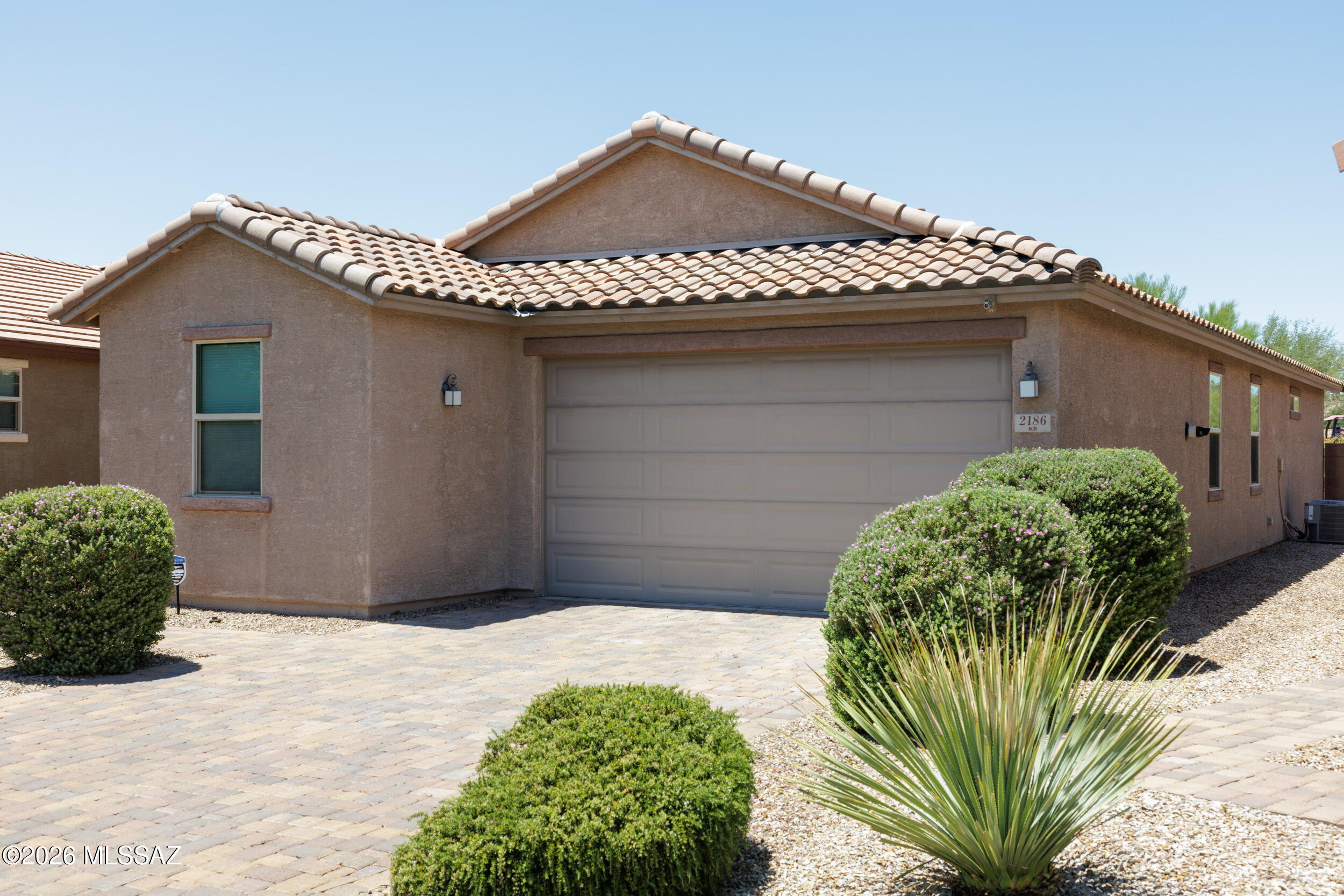 3 Bed + Den / 2 Bath | 1,861 Sq Ft Home in Gated Northwest Tucson Community
Beautifully situated on a private lot with no neighbors behind, this spacious and highly energy-efficient home is located in a desirable gated community adjacent to Omni Tucson National Resort.
This 1,861 sq ft home features 9-foot ceilings, an open-concept layout, and a large covered back patio perfect for enjoying Tucson evenings. The gourmet kitchen offers upgraded stainless steel appliances including a gas cooktop, combination microwave/wall oven with steam clean AccuBake, side-by-side French door refrigerator, solid surface countertops, custom backsplash, and cherry shaker cabinets with 42-inch uppers.
Upgraded 20x20 tile flooring runs throughout the main living and traffic areas, while the bedrooms feature upgraded carpet and pad for added comfort. The flexible den space is ideal for a home office, gym, or guest space.
Located in a sought-after Northwest Tucson community close to golf, dining, shopping, and outdoor recreation, this home combines privacy, efficiency, and quality finishes in an exceptional setting.