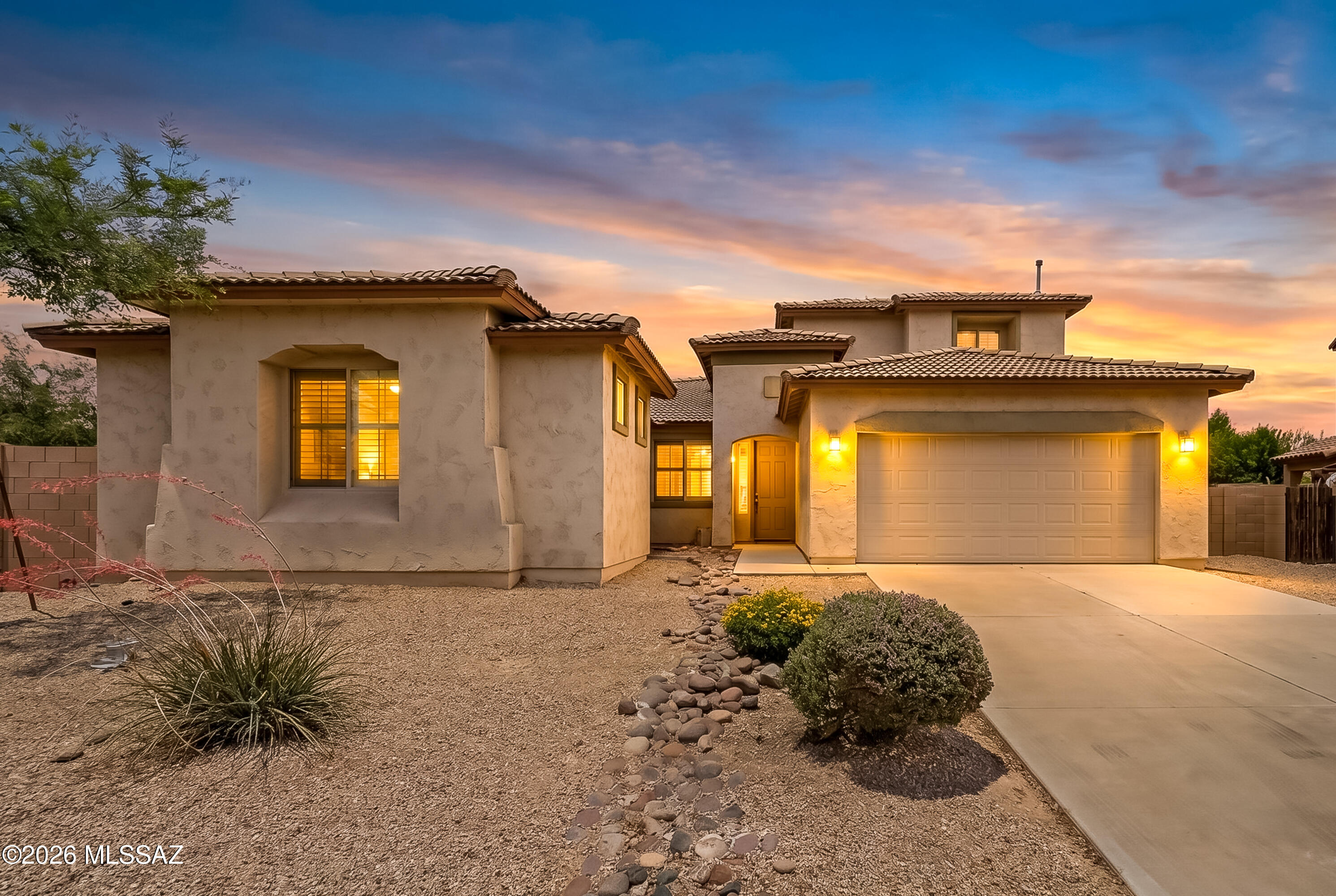 Nestled on a premium lot with direct park views, this 3,100 sq. ft. sanctuary offers unmatched peace and privacy. The spacious layout features a split floor plan, ensuring a private master retreat separate from the secondary bedrooms. A versatile upstairs loft with its own bath functions perfectly as a media room, home office, or extra bedroom.
Guests will love the casita, providing a quiet, independent space for visitors. Outside, enjoy a secluded backyard that isn't overlooked, complete with a gated pet run and easy access to neighborhood trails for long walks through mature trees and grass. While the setting is serene, modern convenience is at your doorstep with the new nearby Fry's. Combining luxury, a rare location, and functional space, this home is a true desert gem.