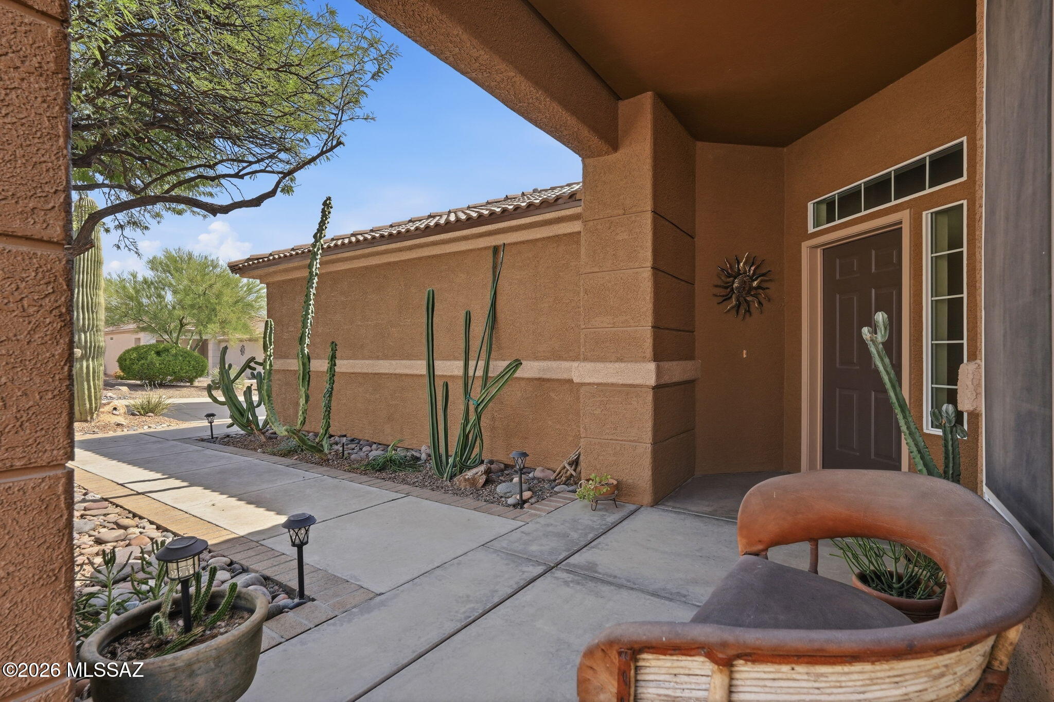 Welcome to the scenic resort-style desert living in the highly desirable Highlands at Dove Mountain! Ideally siituated on a peaceful cul-de-sac and generous lot, this inviting home offers 2 Bedroom, 2 full Baths and 1,468 sqs.ft. of thoughtfully designed living space. The open floor plan creates an easy flow for everyday living and entertaining, with a spacious chef's kitchen opening beauifully to the main living area. Step outside to a serene backyard surrounded by natural beauty, offerng a peaceful setting to relax, entertain and enjoy! Adding to the home's appeal a new roof was installed in  2026. Don't miss this opportunity!