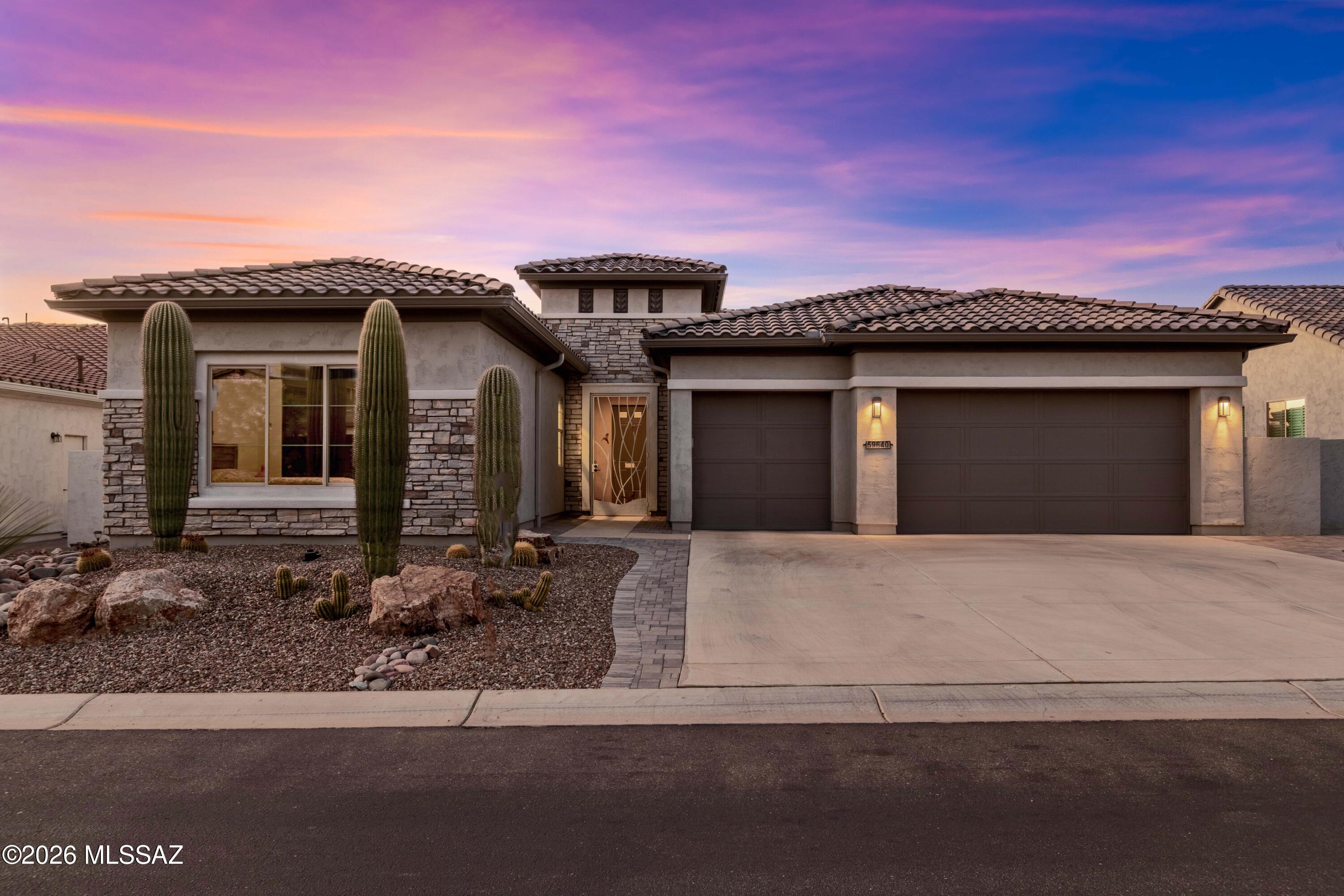 Perfectly positioned on the 16th hole of the prestigious SaddleBrooke Ranch Golf Club, this luxurious and highly upgraded popular Vienta floor plan offers the ultimate blend of elegance, comfort, and breathtaking desert beauty. Showcasing 2,648 square feet of thoughtfully designed living space,this exceptional residence features 3 spacious bedrooms, 3.5 baths, and an expansive den/office with privacy doors--perfect for working from home or accommodating guests.
From the moment you arrive, the custom front security screen door and welcoming courtyard set the tone for the refined finishes found throughout. Inside, soaring ceilings, upgraded flooring, solid core doors, and sound-insulated walls create a quiet, sophisticated atmosphere filled with natural light and expansive golf course views The gourmet chef's kitchen is truly the heart of the home, beautifully appointed with quartz countertops, designer tile backsplash, upgraded cabinetry with custom hardware, stainless steel appliances, full-extension soft-close drawers, and a spacious walk-in pantry. The open-concept design flows seamlessly into the large great room with built-in cabinetry and a separate dining area--ideal for both everyday living and effortless entertaining. 
The luxurious primary suite is a true retreat, featuring dual vanities, an upgraded curbless walk-in shower with floor-to-ceiling tile, and an expansive walk-in closet. Two additional guest suites each offer full private baths, creating comfort and privacy for family and visitors alike. 
Step outside to your expansive covered patio with epoxy coating, where panoramic golf course, mountain, and sunset views create an unforgettable backdrop. The backyard is designed for easy Arizona living with low-maintenance landscaping, rolling shutters, and optional pavers enhancing the front entry. 
Additional highlights include a large 3-car garage with beautiful epoxy floors, whole-house water softener system, laundry room cabinetry with additional storage, and 6-inch rain gutters already installed. Offered fully furnished, this home presents a rare turnkey opportunity--allowing you to begin enjoying the SaddleBrooke Ranch lifestyle from day one. 
Located within one of Southern Arizona's most sought-after 55+ resort communities, residents enjoy world-class amenities including golf, dining, fitness, pickleball, and an active social lifestyle.
This is more than a home, it's a lifestyle. And opportunities like this, with golf course frontage, stunning views, luxury upgrades, and furnishings included, are exceptionally rare.
