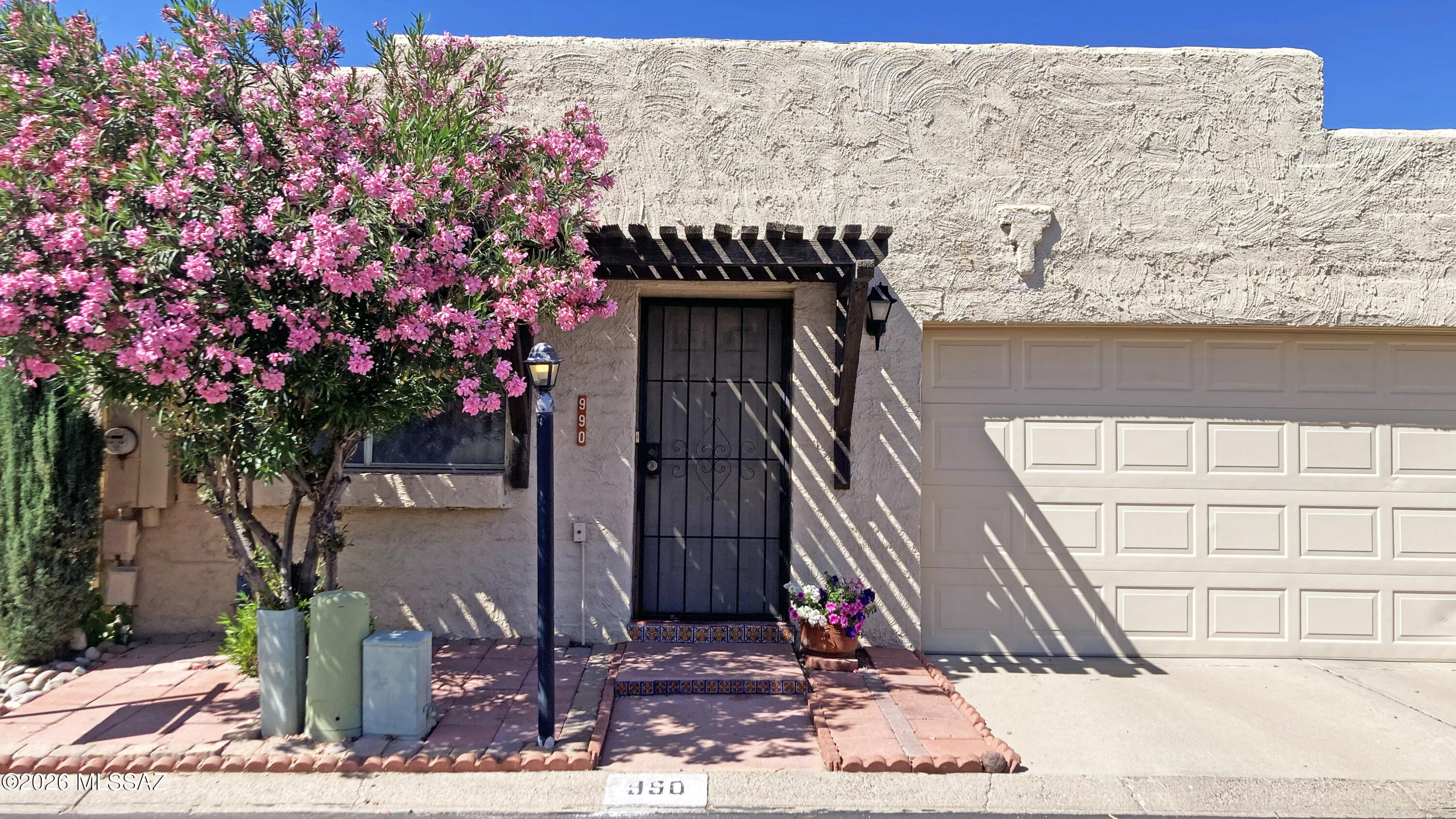 Seller will contribute $5,000 towards buyer's closing costs or rate buydown. The home includes a Shield Essential home warranty through AHS. Welcome home to this beautifully remodeled 2-bedroom, 2-bath townhouse with vaulted ceilings, it perfectly blends modern style with everyday comfort. Every inch of this home has been thoughtfully updated, creating a move-in-ready space you'll love from the moment you walk in.
The stunning new kitchen features sleek cabinetry, granite countertops, and a full suite of brand-new appliances--perfect for cooking, and entertaining.  Both bathrooms have been completely renovated with contemporary finishes, offering a fresh, spa-like feel. The spacious primary suite includes a custom-designed closet, providing exceptional storage and organization. An abundance of natural light with overhead skylights. Enjoy the convenience of low-maintenance living in a highly desirable community featuring a sparkling pool and relaxing hot tub--ideal for unwinding at the end of the day. Located just minutes from the Loop, shopping, and a wide variety of restaurants, you'll have everything you need right at your doorstep.

Stylish upgrades, an unbeatable location, with numerous amenities--this turnkey townhouse truly has it all. Can be furnished or unfurnished.