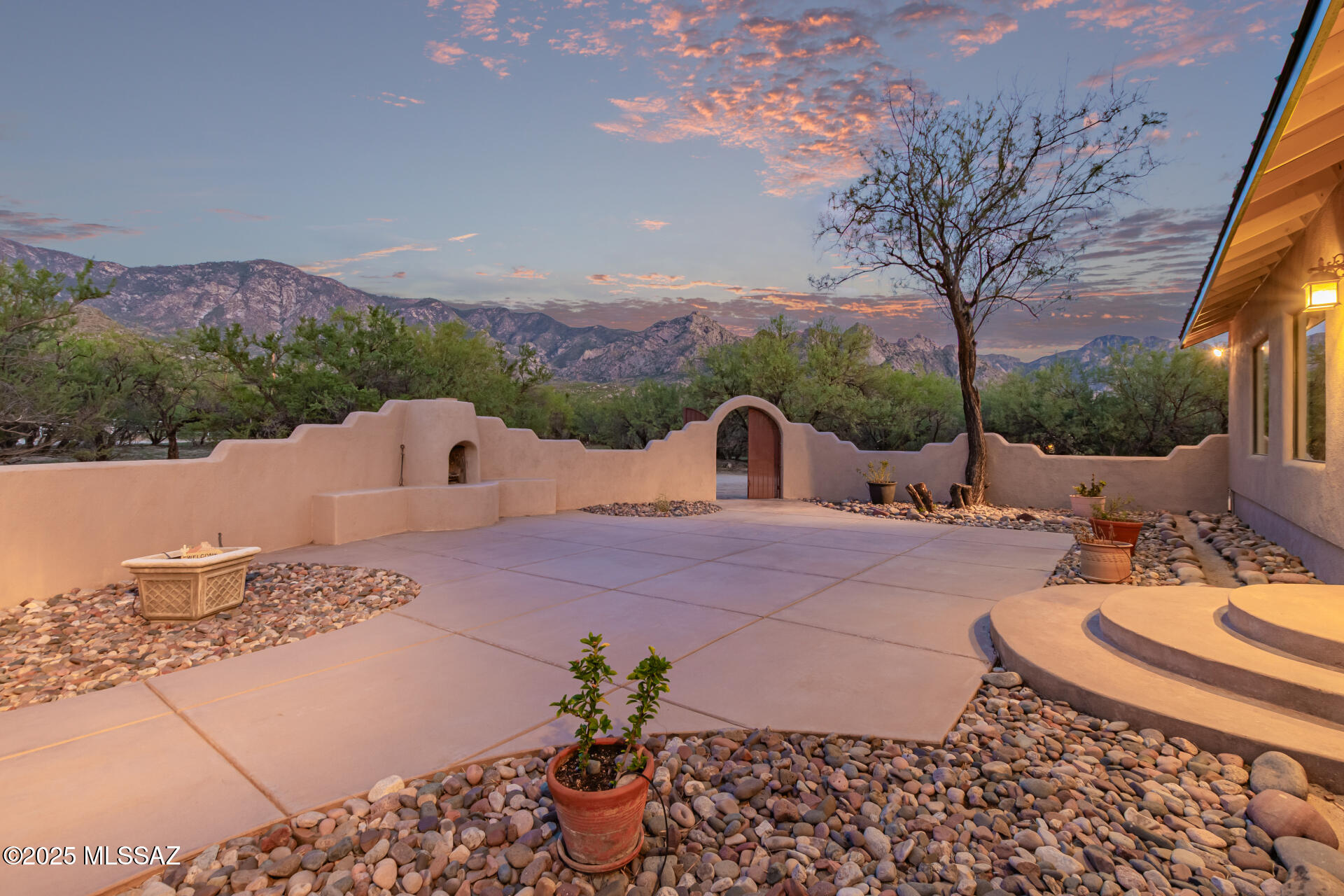 Experience the ultimate desert lifestyle on 4.17 private acres with sweeping mountain views! This premier equestrian property offers rare, direct access to Catalina State Park for day rides into the mountains with horse water access. The custom 2,800+ sq ft main home features travertine floors, hickory cabinetry, and seamless indoor-outdoor flow. A detached 532 sq ft guesthouse is the perfect private studio or visitor retreat. Your backyard is a true resort: relax poolside with a swim-up bar and misting system, or spend evenings by the courtyard chiminea. This estate perfectly balances rugged desert paradise with refined luxury. Whether you're seeking quiet solitude or an entertainer's dream, this is it. Schedule your private showing today.