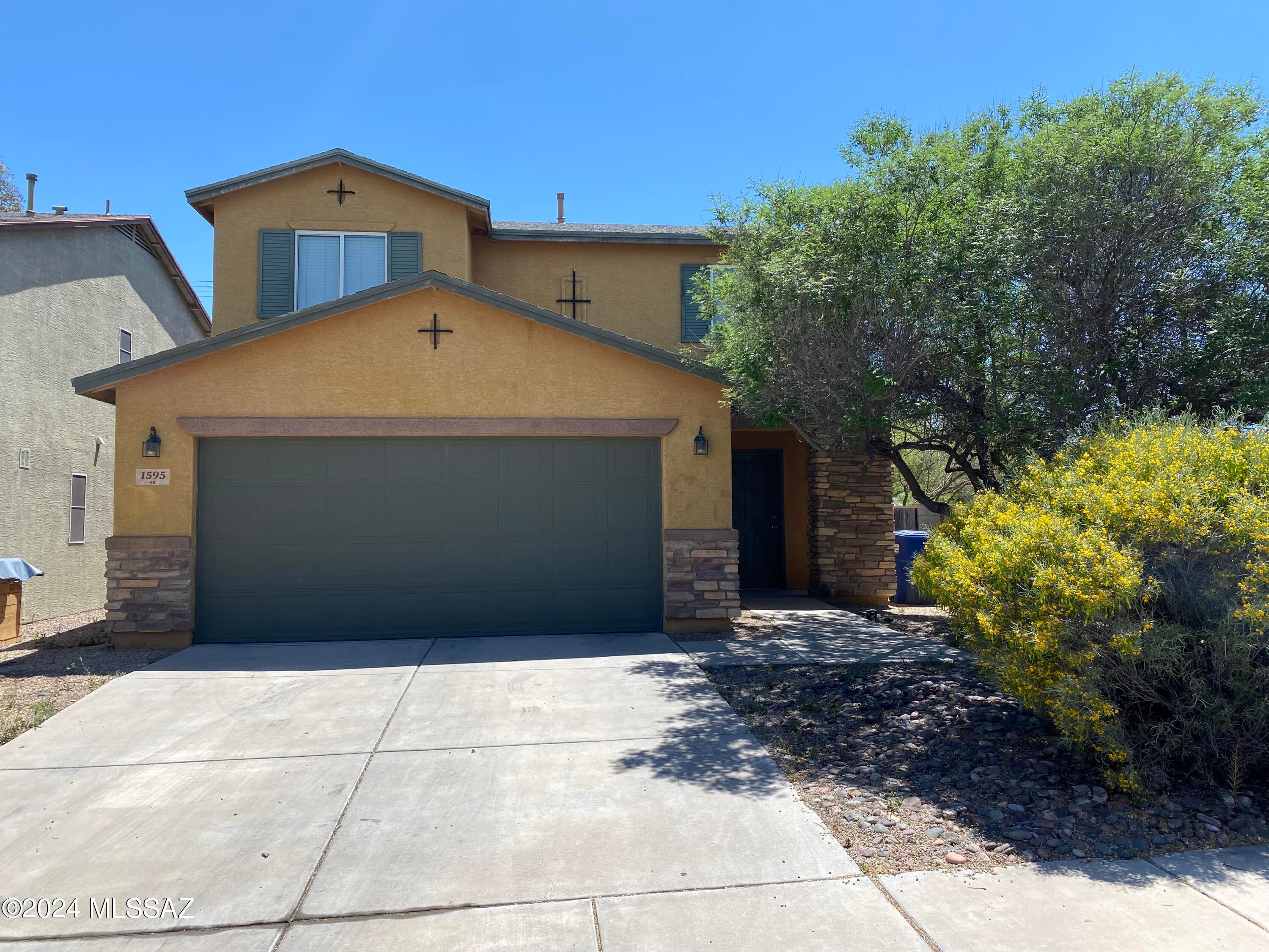 2-story 3 Bedroom, 2.5 Bath House w/ Loft for Rent in Starr Pass. AC cooling. Tile flooring on ground floor and carpet upstairs. The kitchen is equipped with a gas stove, refrigerator, dishwasher, and microwave. Washer/dryer hookups. This house also enjoys a covered rear patio, large walled back yard, and 2-car garage.

Tenant pays all utilities.
Small pets (under 25 lbs.) allowed with a $500 deposit and $25/month pet rent per pet.
Home is in a community governed by the Starr Pass Heights HOA and its rules & regulations.