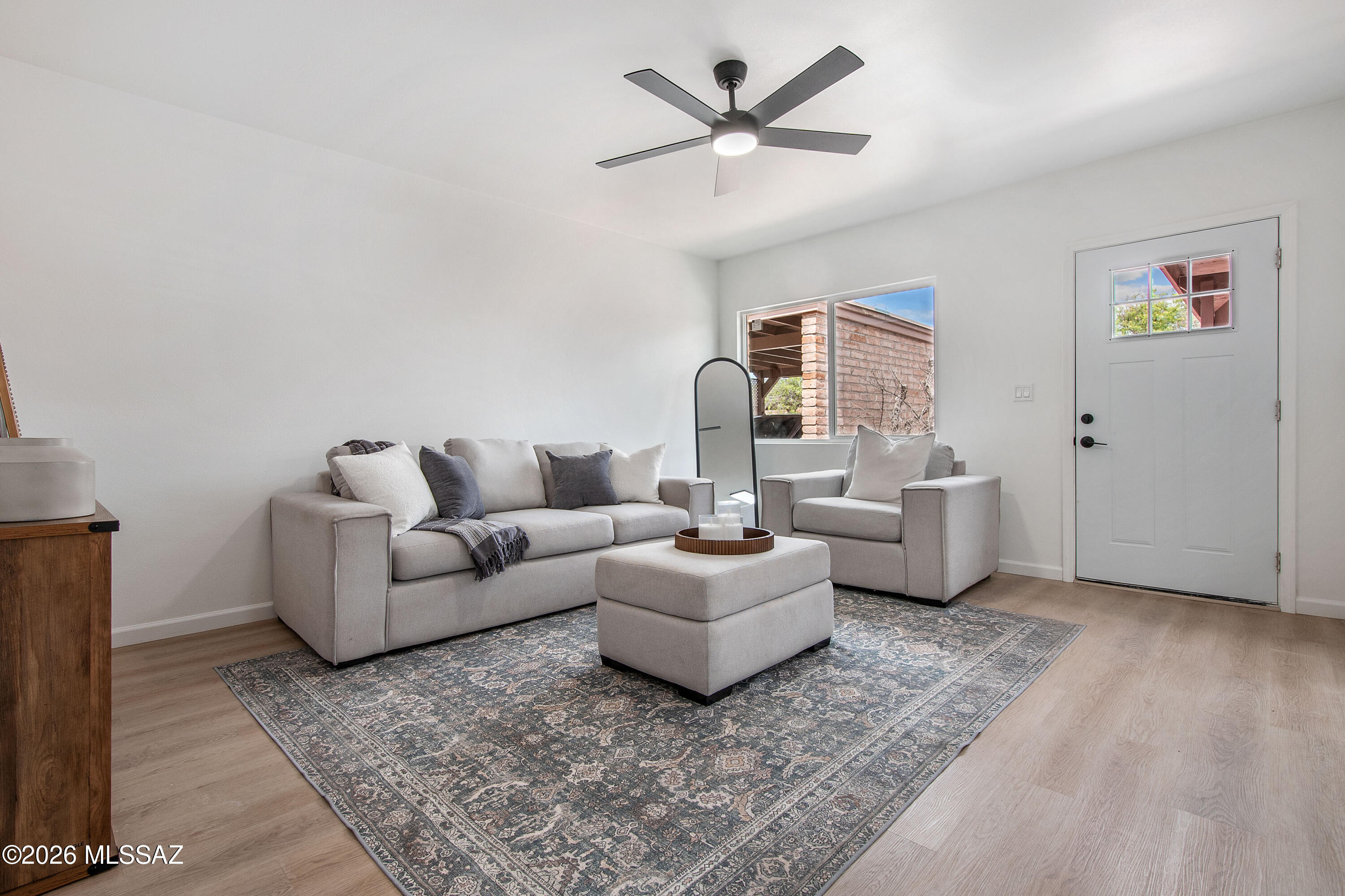 Beautifully renovated 2-bedroom, 1-bath townhome in the heart of Central Tucson! This move-in ready property features a bright, open-concept living space with abundant natural light and modern finishes throughout. Enjoy brand-new laminate wood-look flooring, fresh interior updates, and a clean, contemporary design. The fully updated kitchen showcases white shaker cabinetry, sleek quartz countertops, stainless steel appliances, and ample storage. The spacious living and dining areas create a seamless flow perfect for both relaxing and entertaining. Both bedrooms are generously sized with comfortable layouts, while the remodeled bathroom features stylish fixtures and finishes. Major system upgrades include a new HVAC system and a new roof, offering peace of mind for years to come. Agent/owne Step outside to your private patio area--ideal for enjoying Tucson's beautiful weather. Conveniently located near shopping, dining, parks, and the University of Arizona, this centrally located townhome is perfect as a primary residence, second home, or investment opportunity!