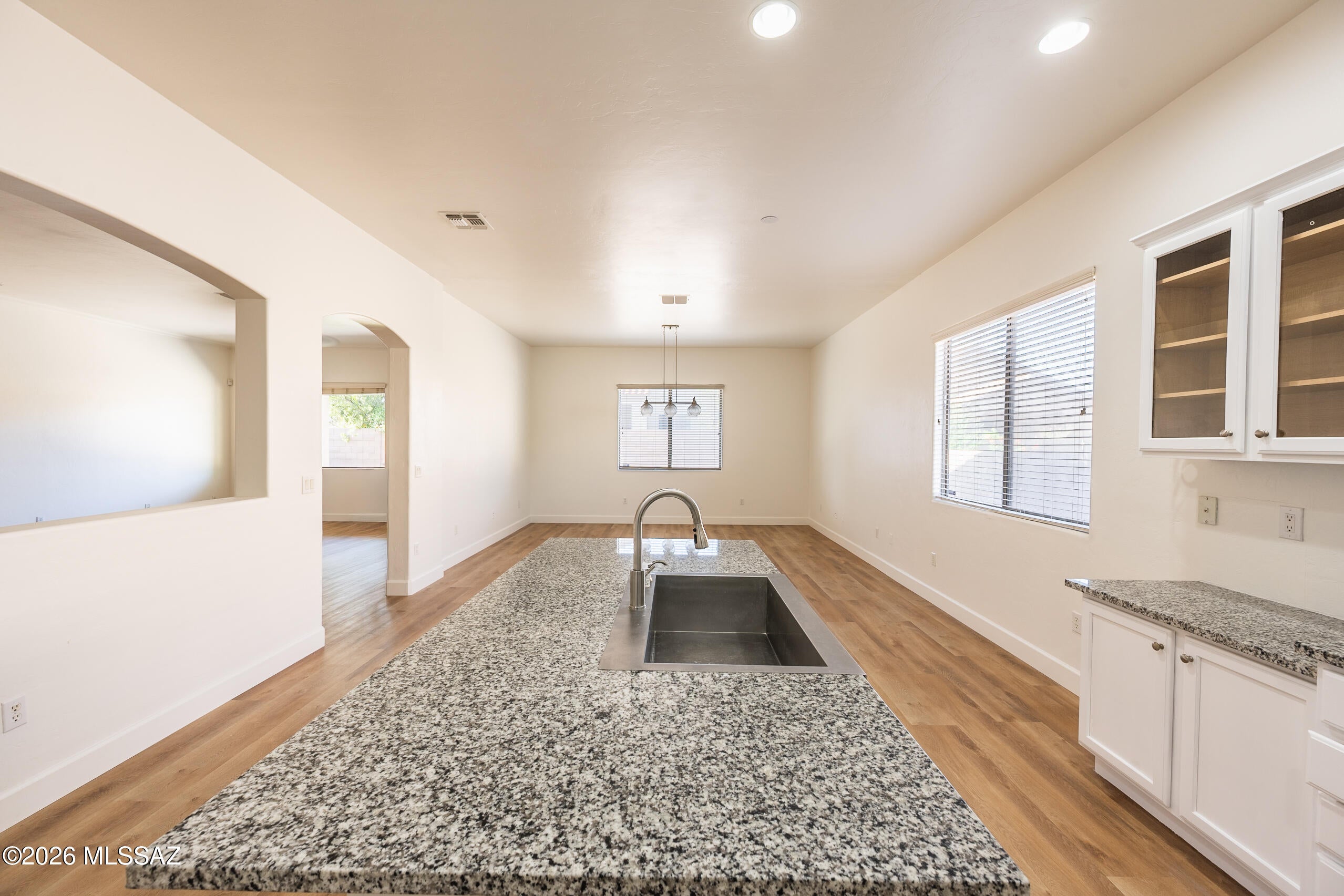OWNER/AGENT. Range-priced *Sellers will entertain offers between 340,000-350,000*  MUST SEE!! This gorgeous Lennar Everest 2,338 square ft home is a home that provides space and comfort that you don't see as much anymore in newer homes. This home has just been freshly painted and has beautiful new LVP flooring throughout the home with new carpet in the 3 guest bedrooms. The kitchen cabinets were just Painted and the Island was just rebuilt for a modern more spacious kitchen along with newer Granite countertops and a stainless-steel farmers sink. The home Features 4 bedrooms, 2 baths, generously sized rooms, sky high ceilings and a big 3 car garage. Owner/Agent
