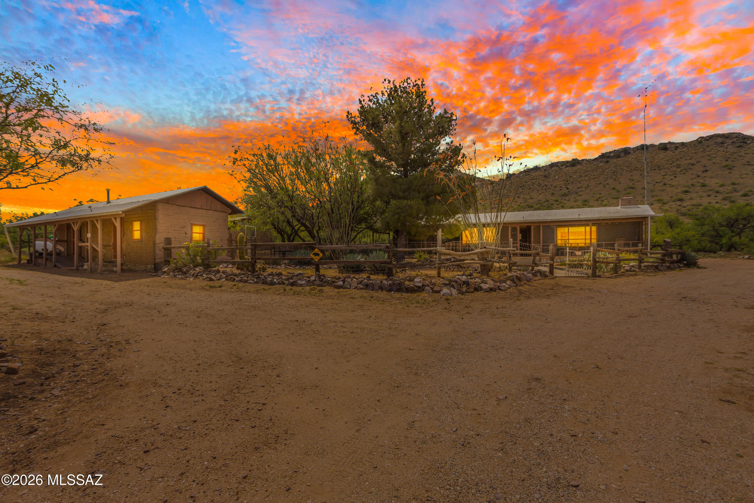 Set against the breathtaking backdrop of Southeastern Arizona's rolling landscapes and mountain ranges, the Dos Cabezas Inn is a rare opportunity to own an established, income-producing retreat in the heart of Willcox wine country. Situated on 3.01 scenic acres with sweeping panoramic mountain views in every direction, this fully furnished property combines hospitality, privacy, and lifestyle in one unforgettable setting.

Currently operating as a successful Airbnb with a steady and proven income stream, the property has been thoughtfully configured to provide both flexibility and privacy for guests and owners alike. Featuring three separate structures, each with its own private entrance, the layout is ideal for short-term rentals, private guest accommodations, retreats, group gatherings or even multi-generational living. Whether guests are enjoying a quiet weekend exploring Arizona wine country or taking in the peaceful desert sunsets beneath the stars, the setting creates an experience that keeps visitors coming back.

Adding to its unique appeal, the Dos Cabezas Inn was featured in Travel + Leisure magazine, highlighting both the character of the property and the incredible setting that makes it such a sought-after destination. Its established reputation and recognizable presence further elevate the opportunity for continued success as a hospitality property.

Each structure offers its own unique charm and functionality, while the fully furnished sale allows for a seamless transition to the next owner. The property has been carefully curated to blend comfort with the natural beauty of the surrounding landscape, creating an inviting atmosphere that perfectly complements the relaxed pace and character of the Willcox area.

Outside, the views truly take center stage. Surrounded by expansive skies, dramatic mountain ranges, and the quiet beauty of the high desert, the property offers a level of peace and serenity that is increasingly hard to find. Guests and owners alike can enjoy stunning sunrises, colorful desert sunsets, and dark night skies filled with stars--all from the privacy of the property's 3.01 acres.

Located in the highly sought-after Willcox wine region, the Dos Cabezas Inn is positioned near some of Arizona's most well-known wineries, vineyards, and tasting rooms, making it an ideal destination property for travelers seeking a unique Arizona experience. Its established Airbnb presence, versatile multi-structure layout, and exceptional setting create endless possibilities for continued hospitality use, private retreats, events, or long-term investment potential.

Whether you're looking to step into a turnkey hospitality business, create a private desert compound, or invest in one of Arizona's emerging wine destinations, the Dos Cabezas Inn offers a one-of-a-kind opportunity defined by income potential, flexibility, and unforgettable scenery. Schedule your private tour today!