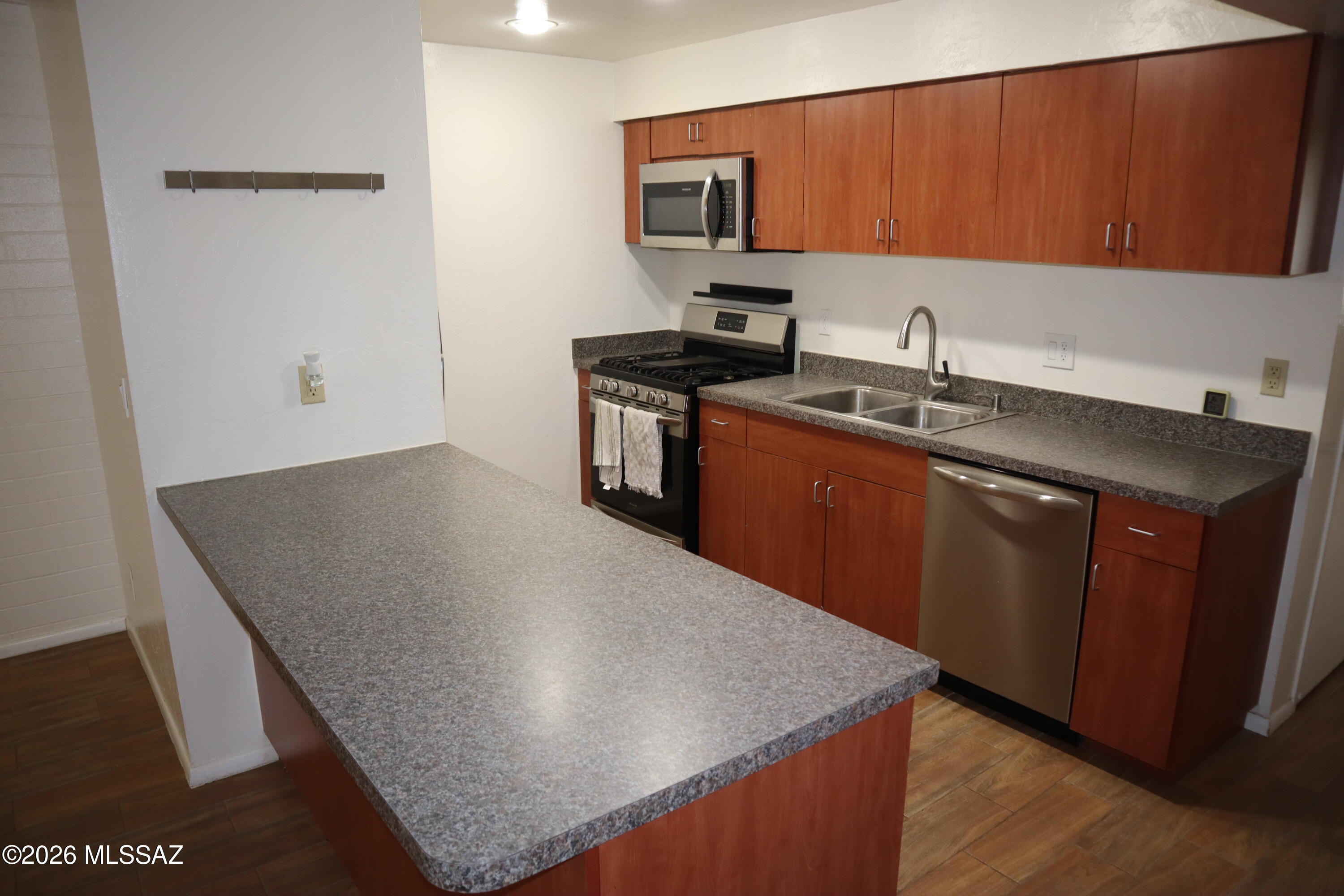This inviting 2 bed, 2 bath condo offers a comfortable layout in a gated community with air conditioning included, a community pool, and easy access to shopping, dining, and other nearby conveniences. Whether you're looking for a low-maintenance home or a convenient lifestyle, this property combines comfort, security, and location.
