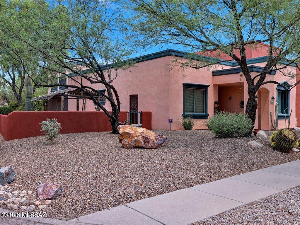 Beautiful, move-in-ready home on a spacious corner lot! The 1,486 sq. ft. main home features 2 bedrooms plus a den, upgraded kitchen and primary bath countertops, and a new primary shower (2024). Thoughtful updates include owned solar, water softener, HVAC (2020), water heater (2024), and new refrigerator, stove, and dishwasher (2025). 

A standout feature is the impressive 520 sq. ft. casita above the garage, complete with a kitchenette, upgraded bath and MOUNTAIN views . This generous, private space offers flexibility as a guest suite, multi-generational living, home office, or potential rental. A truly special addition that sets this home apart!

Outside, the beautifully landscaped yard invites you to relax, entertain, and enjoy Arizona living. Move-in ready and amazing!