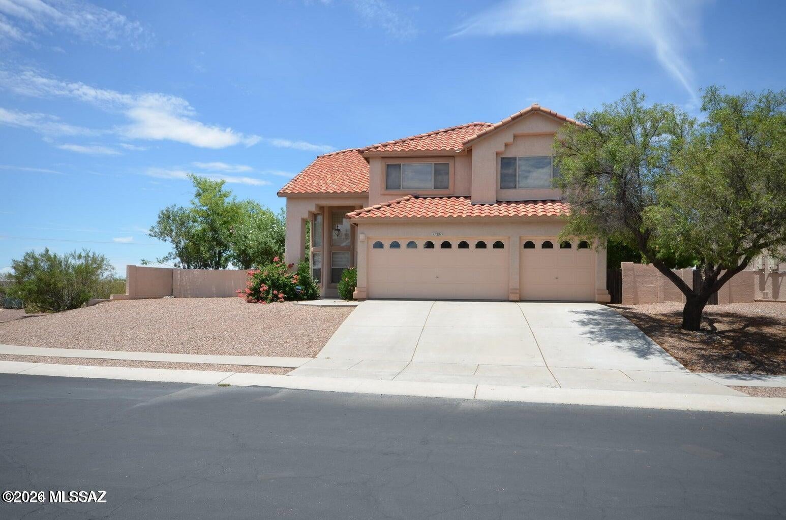 Beautiful 4bdrm, 2.5ba home with a 3-car garage, ideally situated at the end of a quiet cul-de-sac. This spacious home features generously sized guest bedrooms and a large primary suite complete with its own private sitting area overlooking the living room below. The kitchen is well-appointed with SS appliances, reverse osmosis system, and a charming breakfast nook that opens to the inviting family room with a cozy fireplace--perfect for gathering and entertaining. Step outside to enjoy breathtaking views and a sparkling pool, ideal for relaxing on warm summer days. The beautifully landscaped backyard showcases mature pomegranate, apple, lemon, and mandarin orange trees, all accented with elegant lighting for a serene evening ambiance. Come see your beautiful new home today!