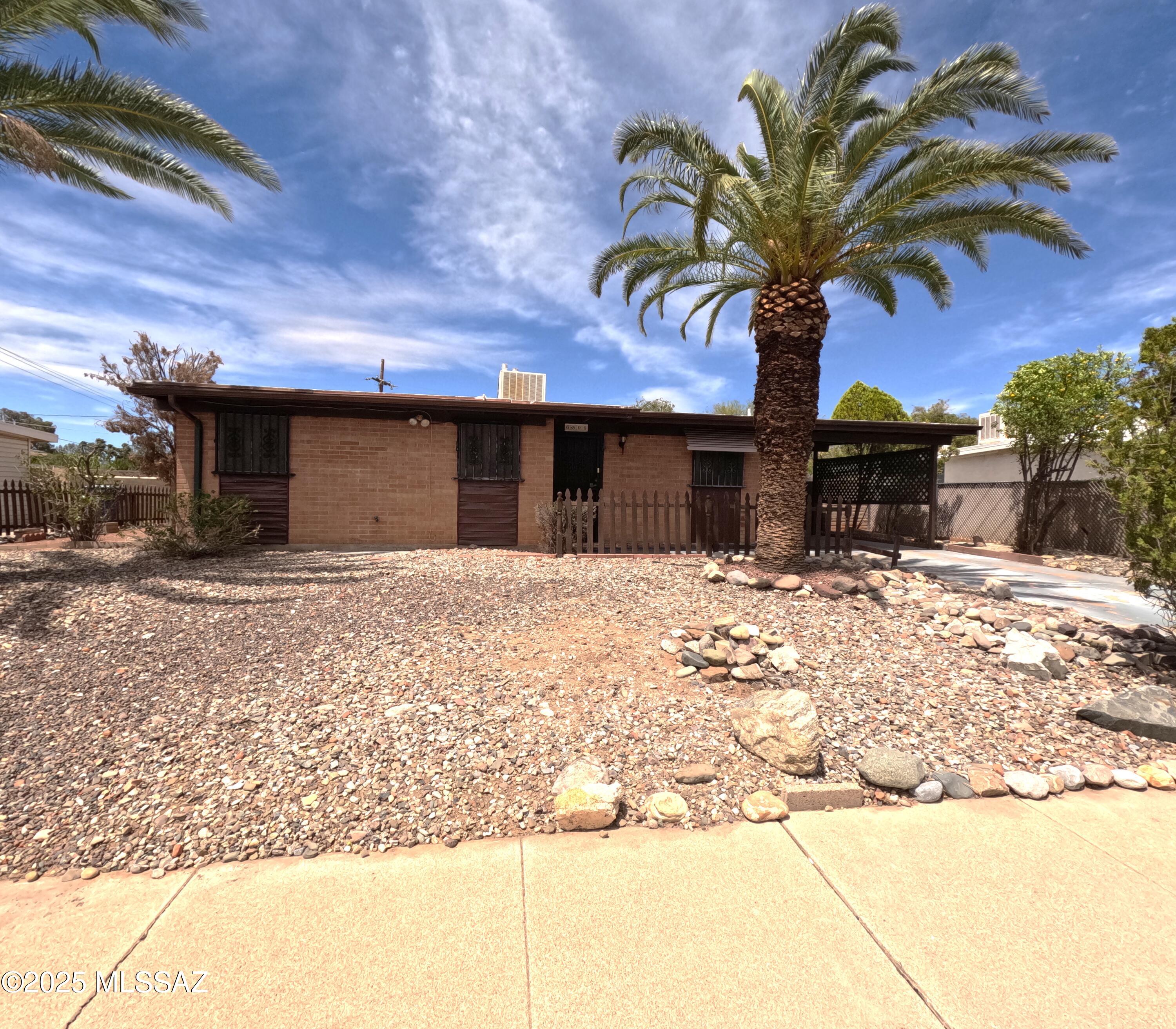BRAND NEW AC/HEATER UNIT! Just installed 6/10/2026.This is a cute 3/2 with a huge covered patio and beautiful mountain views. Beautifully landscaped front and backyard with mature trees, plants and low maintenance. Fully blocked wall around backyard for privacy and relaxation. 2 sheds and carport shed provide lots of storage. New carpet, vinyl and paint throughout the house. New bathroom vanities/sinks,fixtures and toilets. New roof coating. Patio has electrical hookup for spa. Close to eastside shopping and dining. A must see.