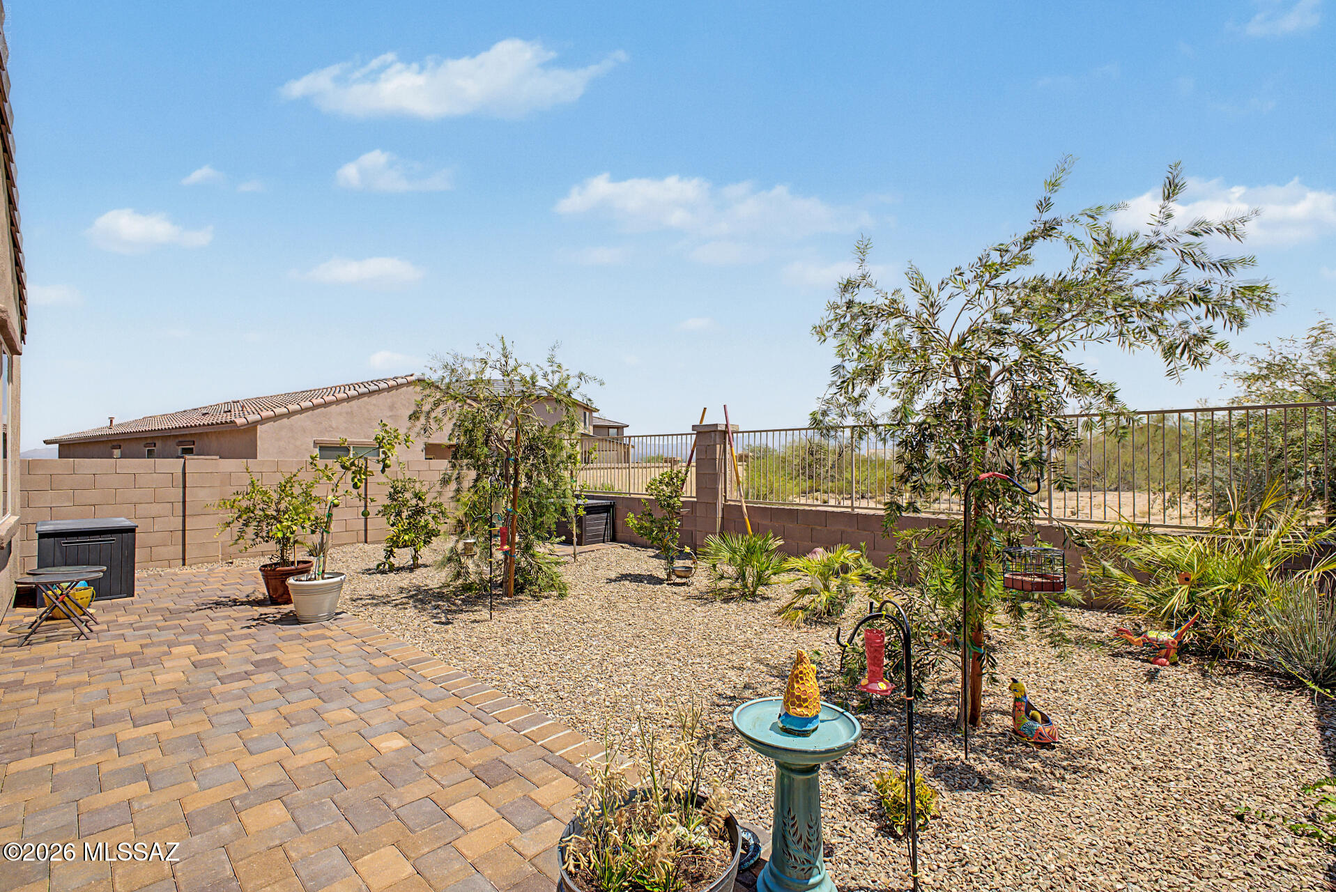 Seller Financing available of 5.5% APR. Seller shall consider 3% concessions on an acceptable offer. Seller will accept or counter offers between $300,000 - $320,000. 3D Matterport & Floor Plan available. Fantastic opportunity to own this beautifully maintained 3-bedroom, 2-bath home featuring over $13,000 in thoughtful upgrades. Inside, you'll love the open-concept floor plan with soaring ceilings, recessed lighting, a warm designer color palette, durable tile flooring, and five upgraded Hunter ceiling fans with remotes and motion sensors for enhanced comfort throughout. The gourmet kitchen showcases granite countertops, rich wood cabinetry with crown molding, stainless steel appliances, a walk-in pantry, and a large island with breakfast bar that is perfect for entertaining. Additional upgrades include enhanced garage lighting with four fluorescent fixtures and motion sensors, professionally installed TV outlets, and a freshly painted garage with convenient pegboard storage.

Step outside to an inviting backyard designed for both relaxation and entertaining. Enjoy the covered patio, upgraded paver patio, professionally landscaped yard with added trees and plants, irrigation extended to the backyard, a premium view fence that maximizes the stunning mountain views, and plenty of space to enjoy Arizona's beautiful weather. This move-in ready home combines modern finishes, quality upgrades, and exceptional outdoor living in one outstanding package.