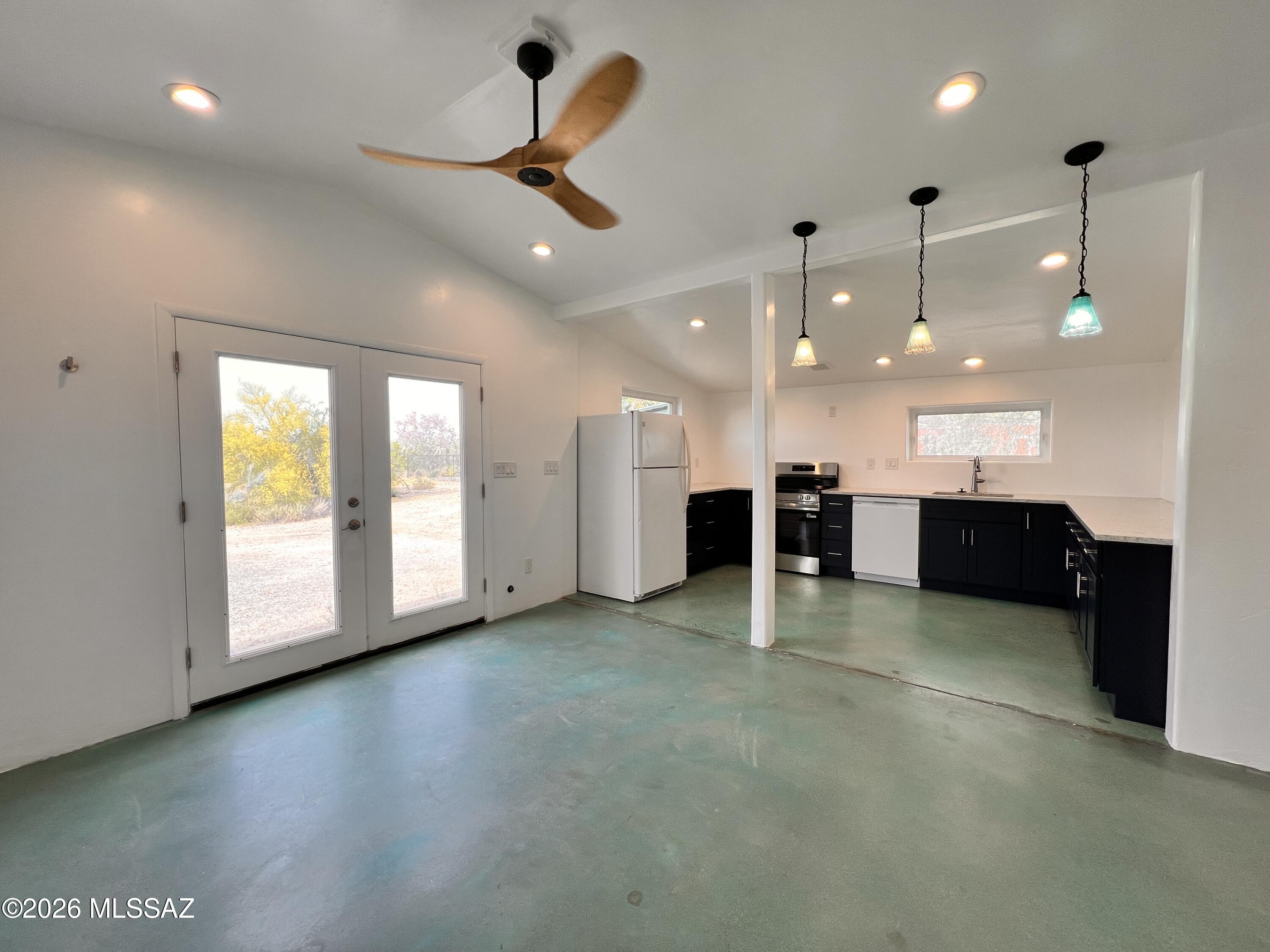 Charming studio in Northwest Tucson with utilities included!
Located minutes off a dirt road, main cross streets are Cortaro/Thornydale).
Stained concrete floors throughout, ceiling fans. Bathroom has a walk-in shower with Pebble Tec floors!
This studio offers stunning mountain views and  shared pool and hot tub!
Please keep in mind this home is located on several acres of land in the desert and is shared by the local wildlife inhabitants!
There is no covered parking.
Internet is included but no cable is out here. Tenants may set up satellite at their own expense.
If you love to live in the country but only minutes to town this home is  right for you!