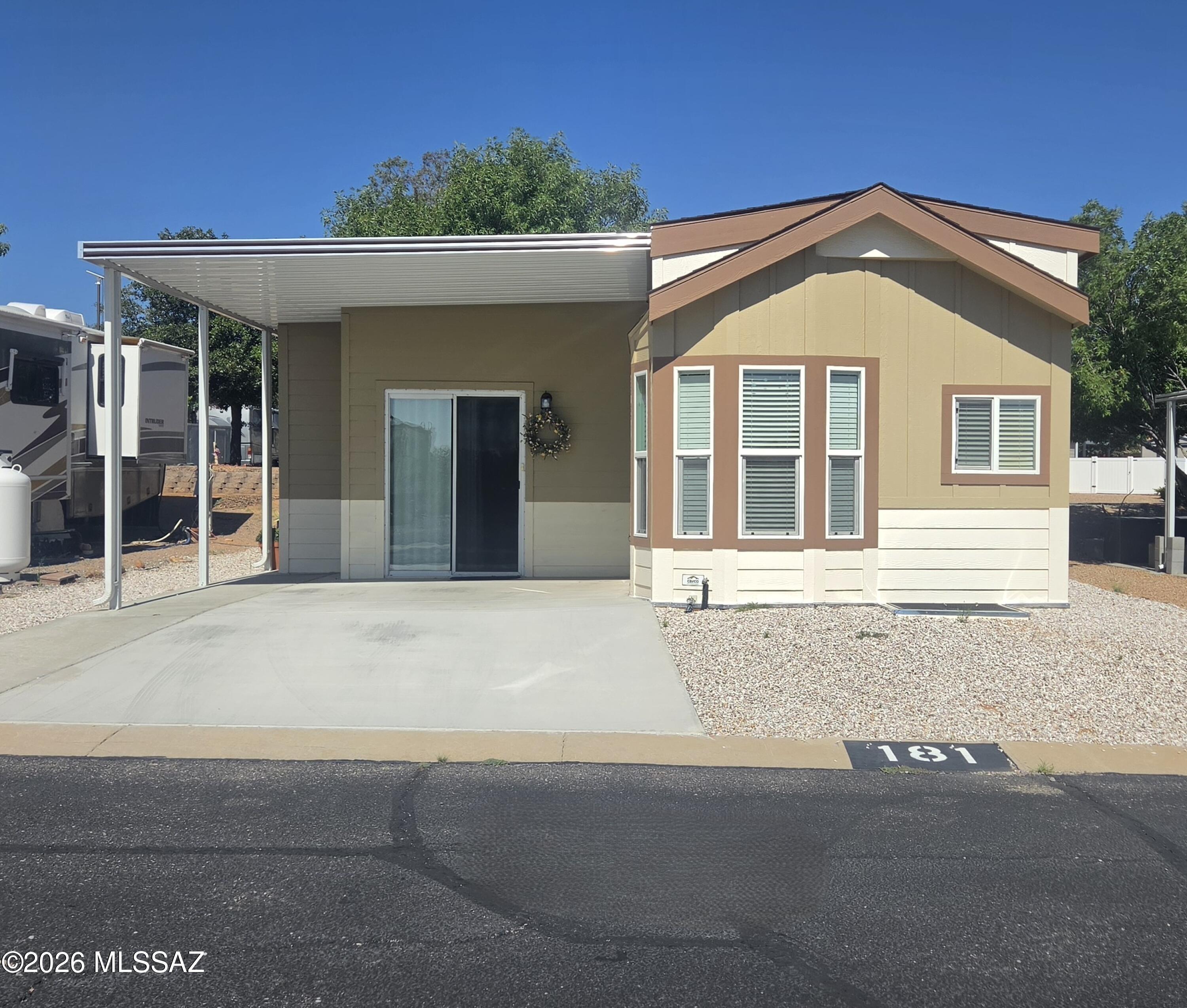 2023 Cavco Malibu Park Model with a 300 sq ft AZ room for a living room area. Unit is being sold furnished. Kitchen stove is gas (propane) and the propane tank is leased. Buyer would have to sign a lease with Barnetts . Main unit has an HVAC for heating and cooling, AZ room has a mini split. Located in the Snowbird Hill section of the CTRV resort.
