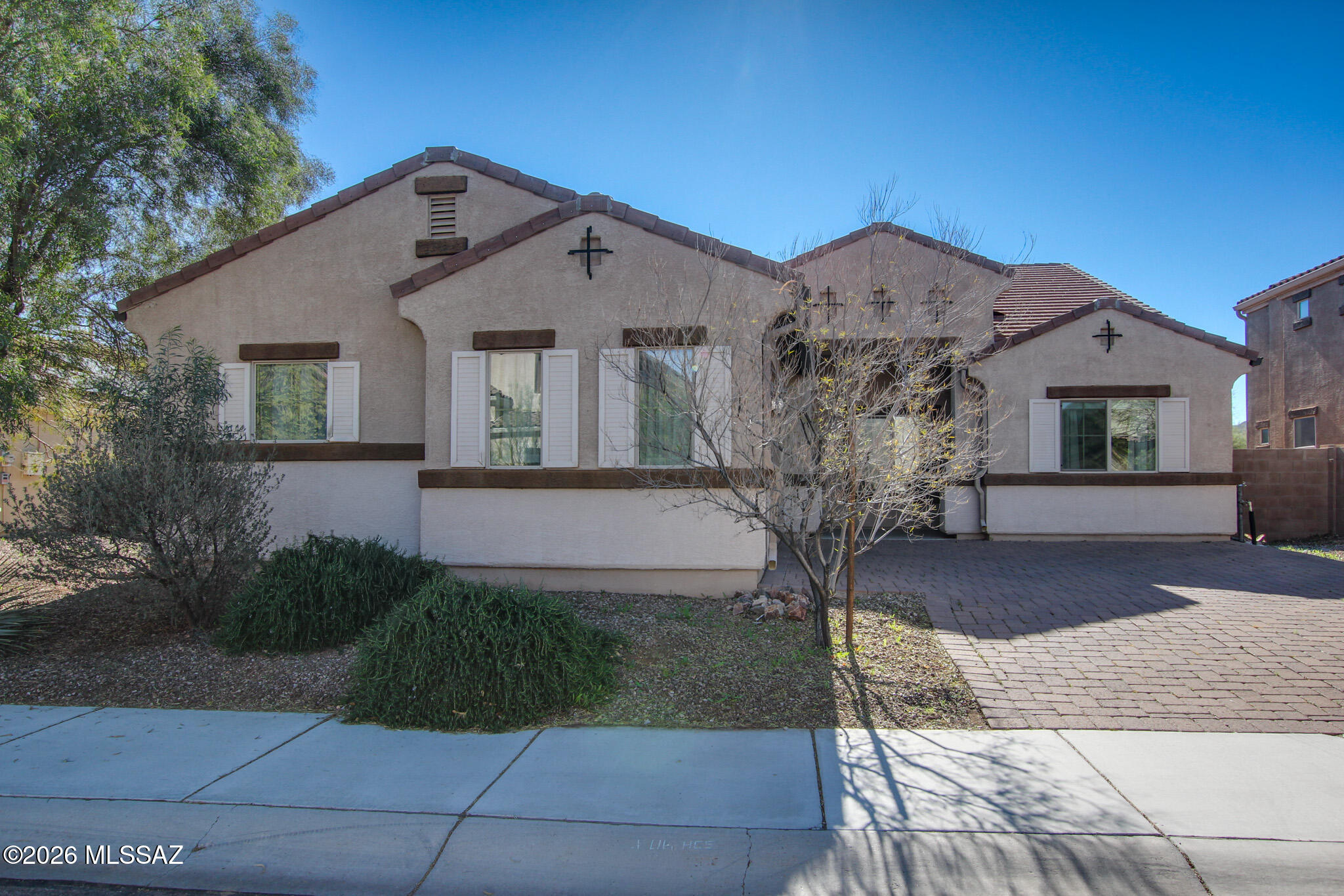 Welcome to this single-story home in the Saguaro Bloom community. This property offers 3 bedrooms, 2 bathrooms, and two additional bonus rooms that can be used as an office, den, or playroom. The open-concept layout includes a kitchen with a central island, granite countertops, and stainless steel appliances. The great room features a gas fireplace.

The home includes a landscaped front and back yard with decorative gravel, desert plants, and a covered patio. Community amenities available to Saguaro Bloom residents include parks, a fitness center, and a pool. This location provides convenient access to shopping, restaurants, and schools.