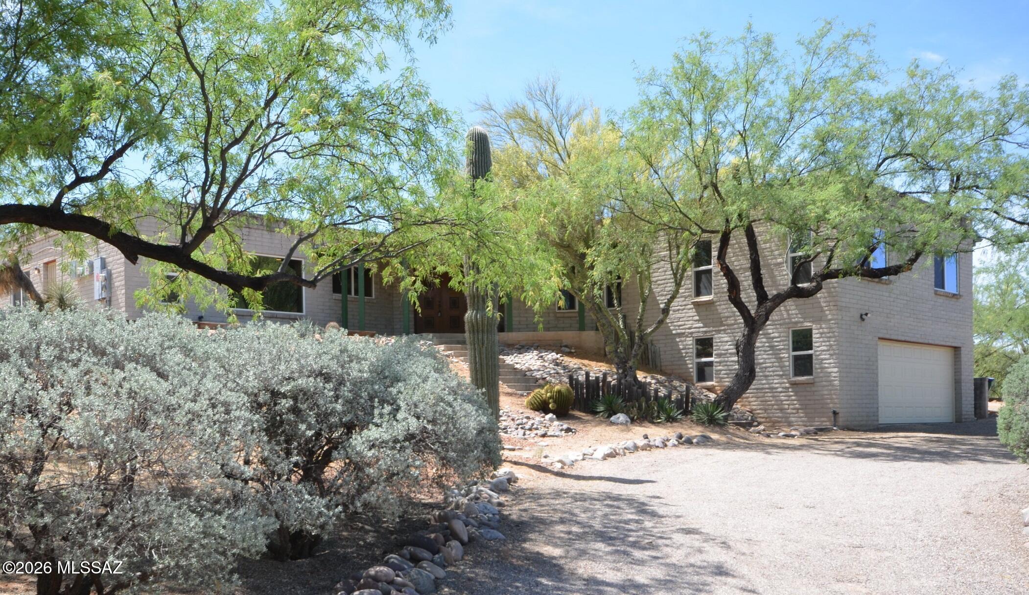 Gorgeous Hill-Top Home, Tucked Away On A Beautifully Landscaped Desert Lot, And In A Prestigious Community! Tons Of Natural Light Shines Through This House, With A Custom Open Layout & Split-Bedroom Floorplan. Backyard Is Large & Private, With A Newly Resurfaced PebbleTec Pool. Home Also Comes With Fully Paid-Off Solar System, With An Electric Bill Less Than $80/mo! Lots Of Workshop & Storage Space. A Rare Find For Less Than A Million In This Area!