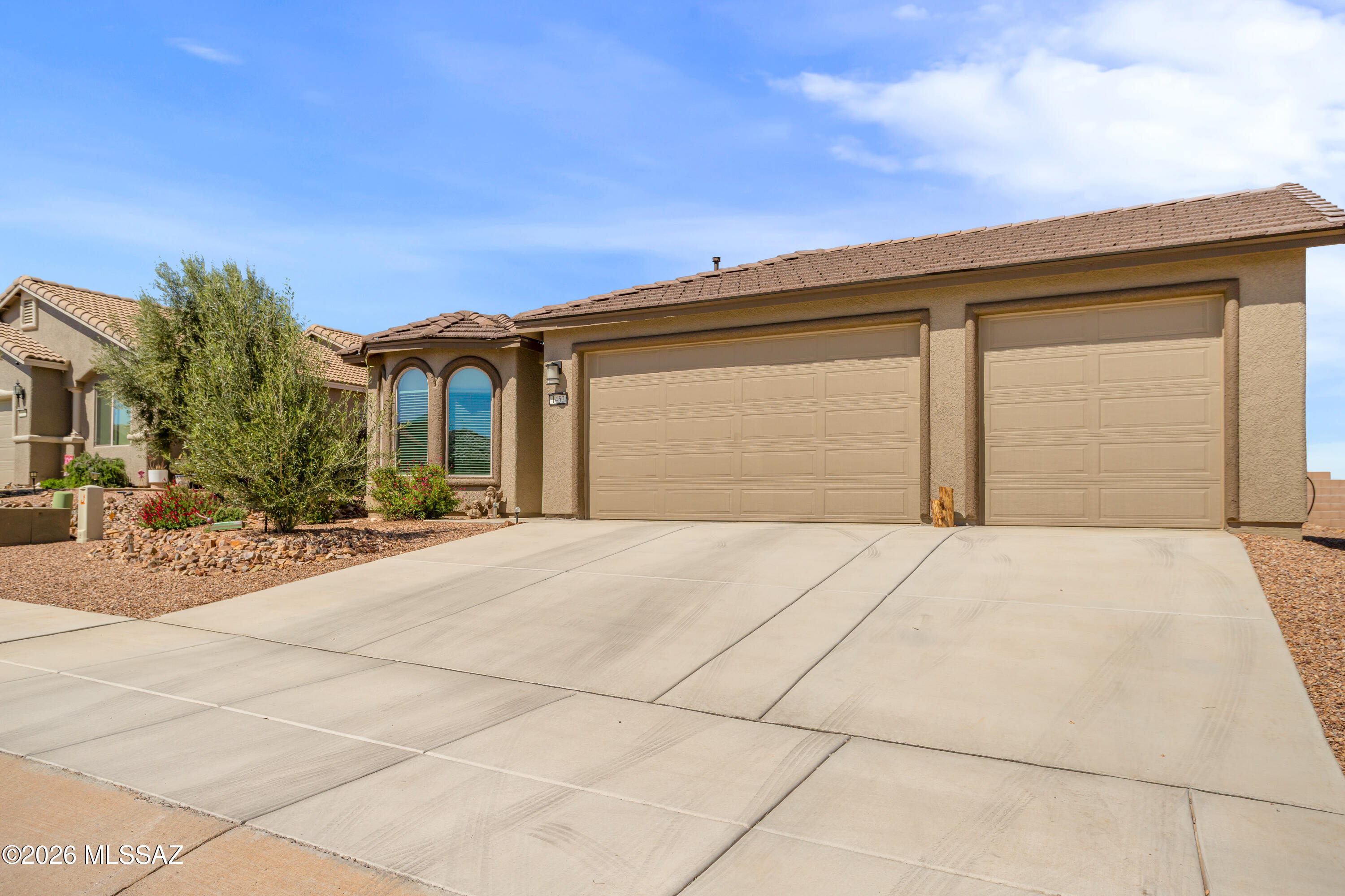 Great location in a growing area with mountain views and great sky. 30 minutes from Tucson and Sierra Vista. This ''Like New'' home by R. L Workman shows the quality of workmanship not found with other builders. With features like natural gas for cooking and heating, a spacious 3 car garage with 8 foot high doors, and 2 very generous pantries, this home is certain to satisfy your household needs. Inside there is upgraded ''wood look'' tile throughout with carpeting in the bedrooms. The kitchen and baths feature upscale quartz countertops. The primary bedroom closet can be described as huge. All rooms are generously sized including the laundry room with extra space for a freezer or even more storage. Overall, a very comfortable, functional and desirable home.