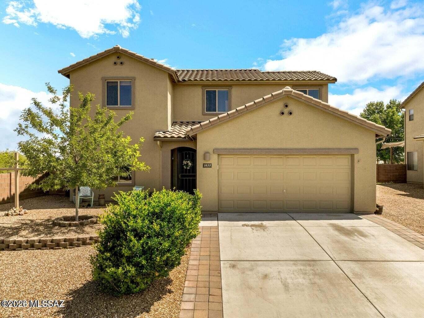 Looking for space, flexibility and stunning views? Look no further! This beautiful 5BR/3BA home features a main-level primary suite with an en suite bath and custom walk-in closet, plus a guest bedroom and full bath. The open-concept kitchen and living area offers an island, 2 pantries and a gas stove. Upstairs you'll find 3 additional bedrooms, a full bath and spacious loft. Enjoy the large backyard with a custom porch and gorgeous views. The 3-car tandem garage features an insulated door. Home was painted a few years ago. Conveniently located for an easy commute to Tucson, Ft Huachuca or Sierra Vista!