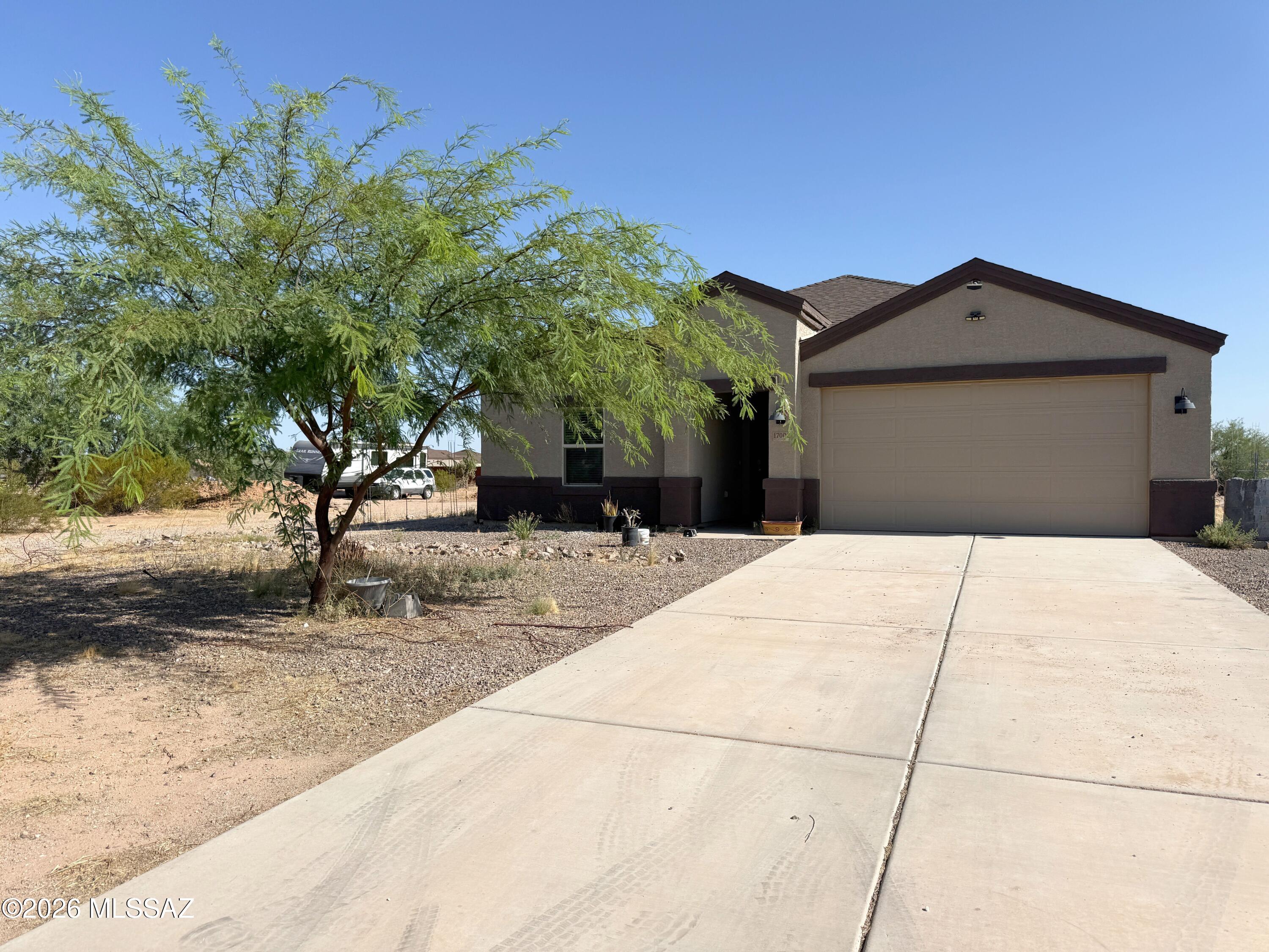 No Application Fees! Spacious single level 4 bedroom, 2 bathroom Marana home with over 2,000 square feet of living space and no HOA. This well-maintained home features an open floor plan with wood plank style tile flooring throughout all living and high traffic areas, neutral carpeting in the bedrooms, two-tone neutral paint, LED lighting throughout, 2-inch faux wood window blinds, ceiling fans, and abundant natural lighting. The spacious living room flows seamlessly into the beautifully appointed kitchen featuring granite countertops and backsplash, oversized island with breakfast bar, extended cabinet and counter space, separate pantry, stainless steel appliances, and plenty of room for entertaining. The desirable split floor plan provides additional privacy with an oversized primary suite featuring a large walk-in closet, dual sink vanity, and spacious step-in shower. Two additional bedrooms offer flexibility for family, guests, or a home office. The attached two-car garage provides ample parking and storage space, while the generous lot offers plenty of outdoor space to enjoy.

Enjoy the freedom of living with no HOA while still being conveniently located near shopping, restaurants, schools, parks, and outdoor recreation. Easy access to I-10, Downtown Tucson, Marana Regional Airport, Dove Mountain, and the growing Marana employment corridor.

All Denali Real Estate residents are automatically enrolled in the Resident Benefits Package (RBP) for $55.00/month which includes Renter's Liability Insurance, Credit Building to help boost the resident's credit scores with timely rent payments, up to $1M Identity Theft Protection, HVAC air filter delivery (for applicable properties), our best-in-class resident rewards program, and much more!