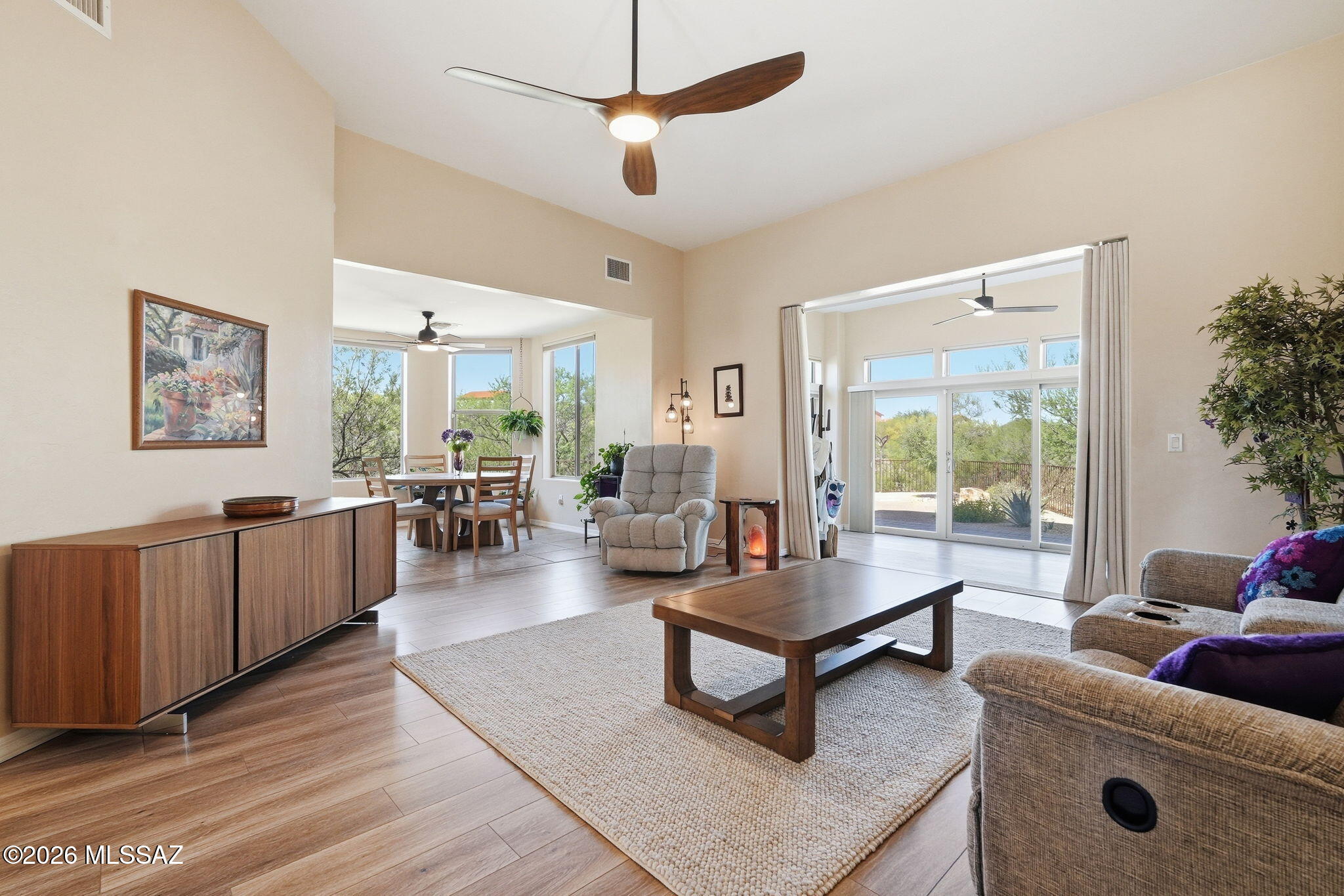 Welcome to Academy Village! This move-in ready 2-bedroom, 2-bath home offers comfort, privacy, and beautiful surroundings. Enjoy unobstructed views of the desert landscape and mountains from the windows overlooking the back patio. The wraparound patio creates multiple outdoor spaces perfect for relaxing, entertaining, or simply taking in the peaceful scenery. With its inviting layout and tranquil setting, this home is a wonderful opportunity to enjoy the best of desert living. Come see it for yourself!