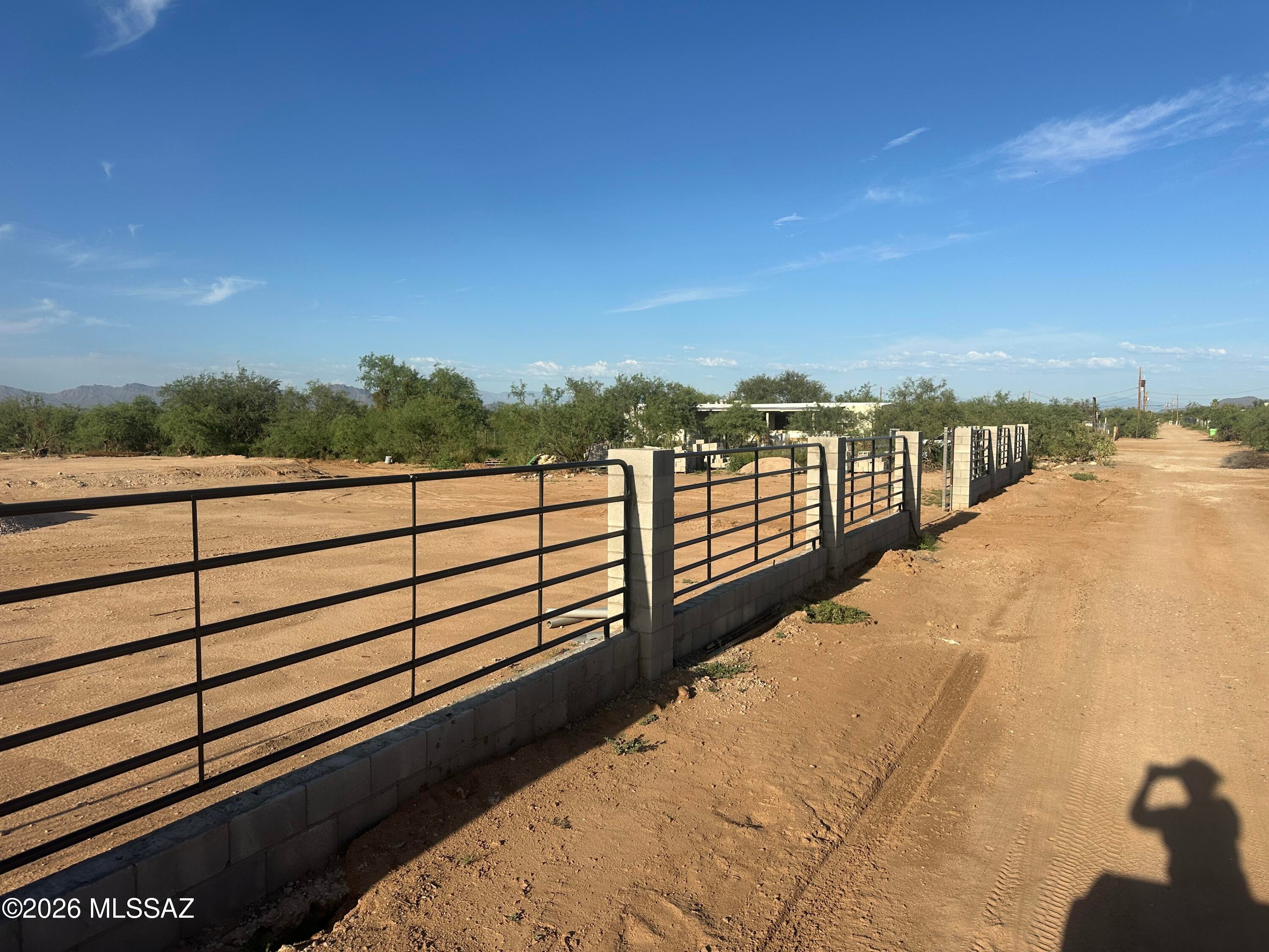 Acre horse property, with utilities, water, electric, septic installed, fully fenced, wrought iron roll gate, block and tube fencing front, trees

dirt raised ready to build, covered parking, home plans included per owner.
Buyer to verify all information