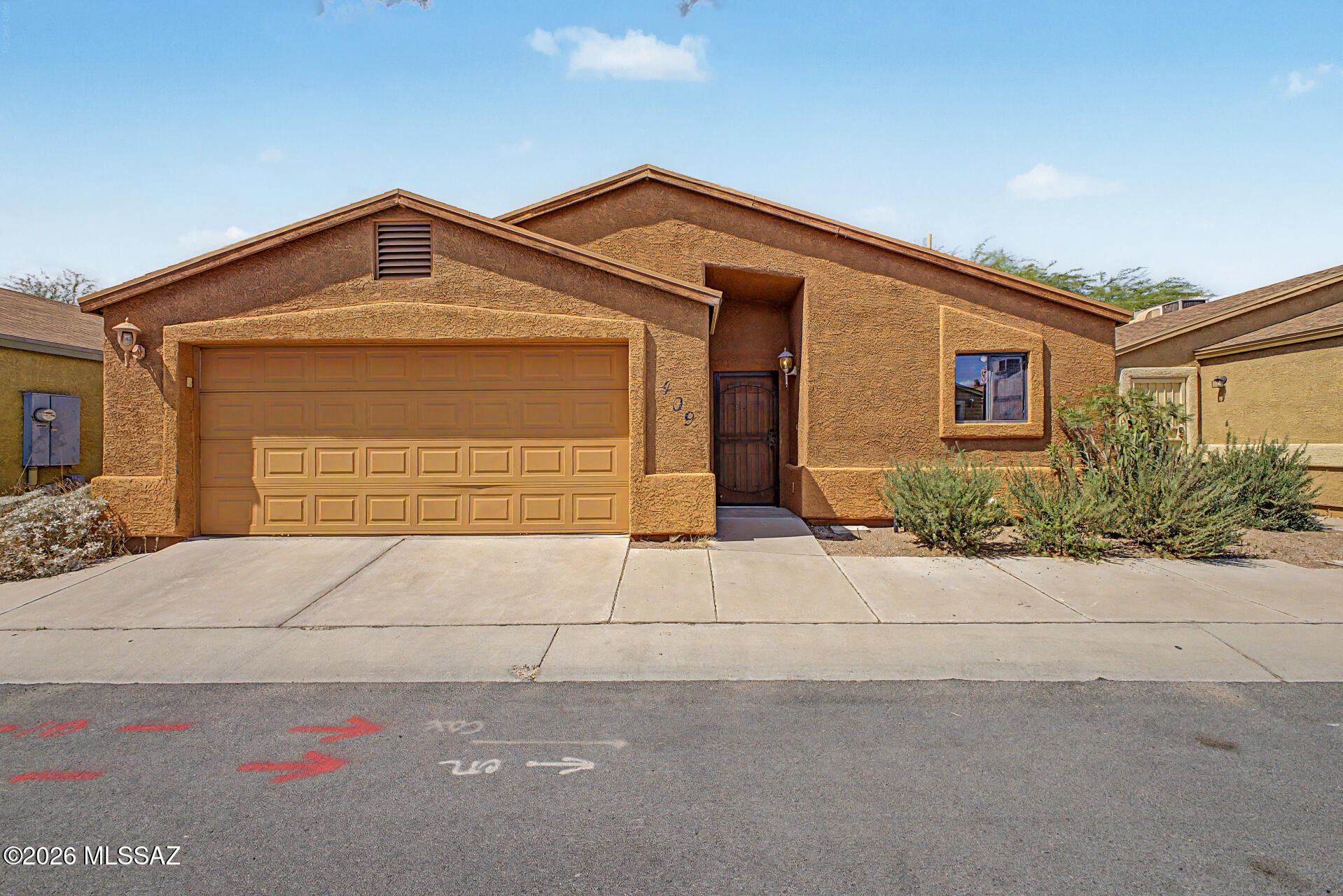 Welcome to this charming 3-bedroom home! Great curb appeal, with a manicured landscape and a 2-car garage. Inside, you will find a bright and open layout with stained concrete flooring, vaulted ceilings for an airy feel, a fireplace to add warmth, a surround sound system for fun movie nights, and an earthy palette throughout. The kitchen comes equipped with oak cabinetry, a spacious peninsula with a breakfast bar, and built-in appliances for a seamless cooking experience. Get a good rest in the main suite, complete with a private bathroom for extra comfort. Out back, you'll have a paver patio, ideal for entertaining and morning coffee, and a hot tub, perfect for relaxation! What's not to love? Make it yours now!