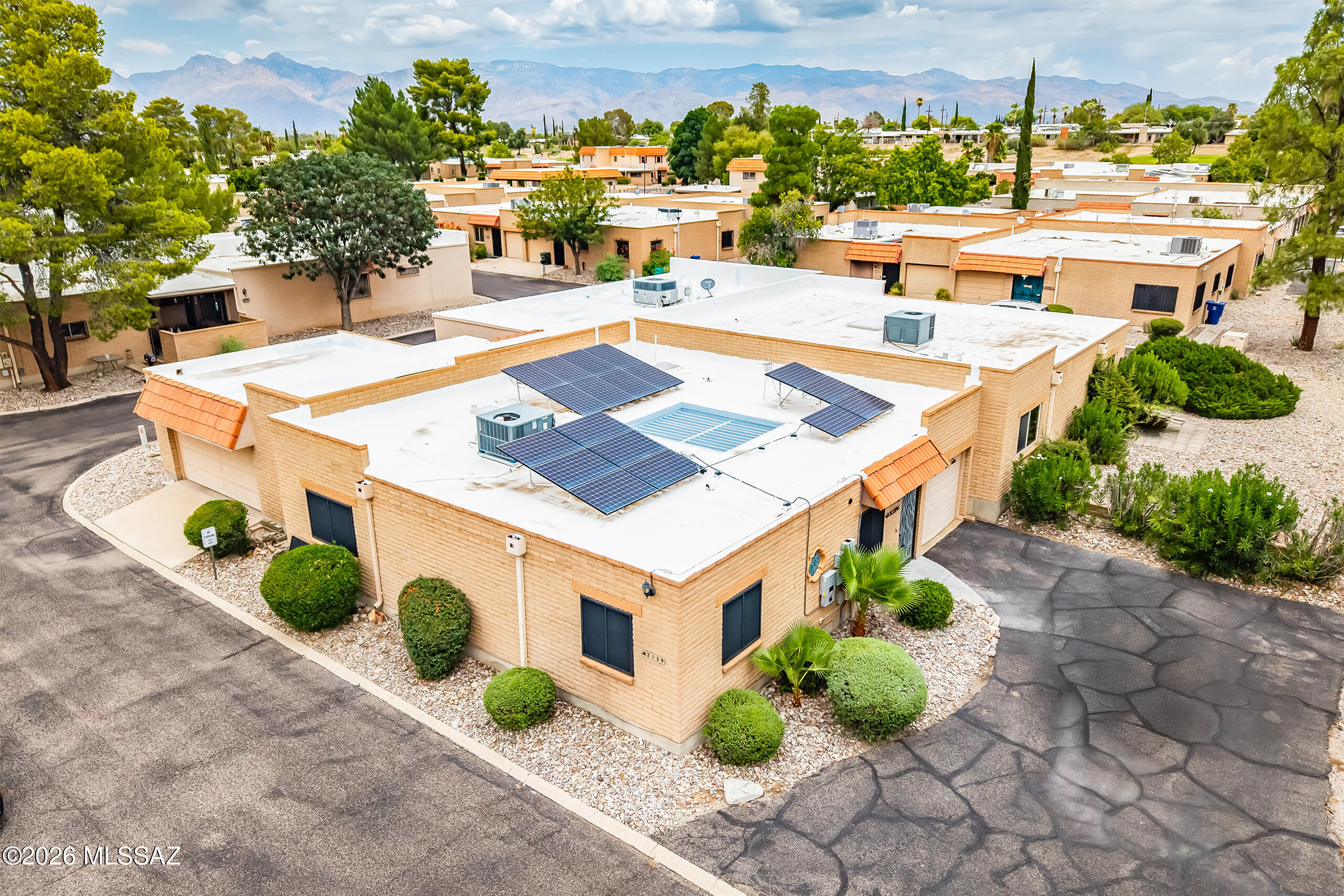 Tucked away at the end of the street, this beautifully maintained end-unit townhome offers exceptional privacy, additional parking, and a welcoming sense of home from the moment you arrive. Pride of ownership is evident throughout.
Inside, you'll find a bright, open main living area filled with natural light, tile flooring in the main living spaces, fresh interior paint, and new carpet in both bedrooms. The kitchen features a pantry, breakfast nook, and opens seamlessly to the dining and living areas, creating an inviting space for everyday living and entertaining.
The primary suite has been thoughtfully updated with a beautifully remodeled bathroom, California Closet system, and new closet doors. The hall bathroom has also been tastefully renovated. Additional features include owned solar, ceiling fans throughout, Bulldog security screens, a dog door, and an attached garage with room for additional storage.
Step outside to your own private interior courtyard with new epoxy flooring--an ideal spot to enjoy your morning coffee, entertain friends, or simply unwind at the end of the day. The community pool and spa are just a short stroll away.
Located in the desirable Rolling Hills community, you'll enjoy convenient access to the 14th tee of Rolling Hills Golf Course, the 130-mile Chuck Huckelberry Loop, nearby schools, shopping, restaurants, and entertainment. The community also offers a secured on-site RV storage facility with security cameras, available for rent (subject to availability).
Move-in ready and thoughtfully updated, this home offers comfort, convenience, energy savings with owned solar, and one of the best locations on Tucson's east side.