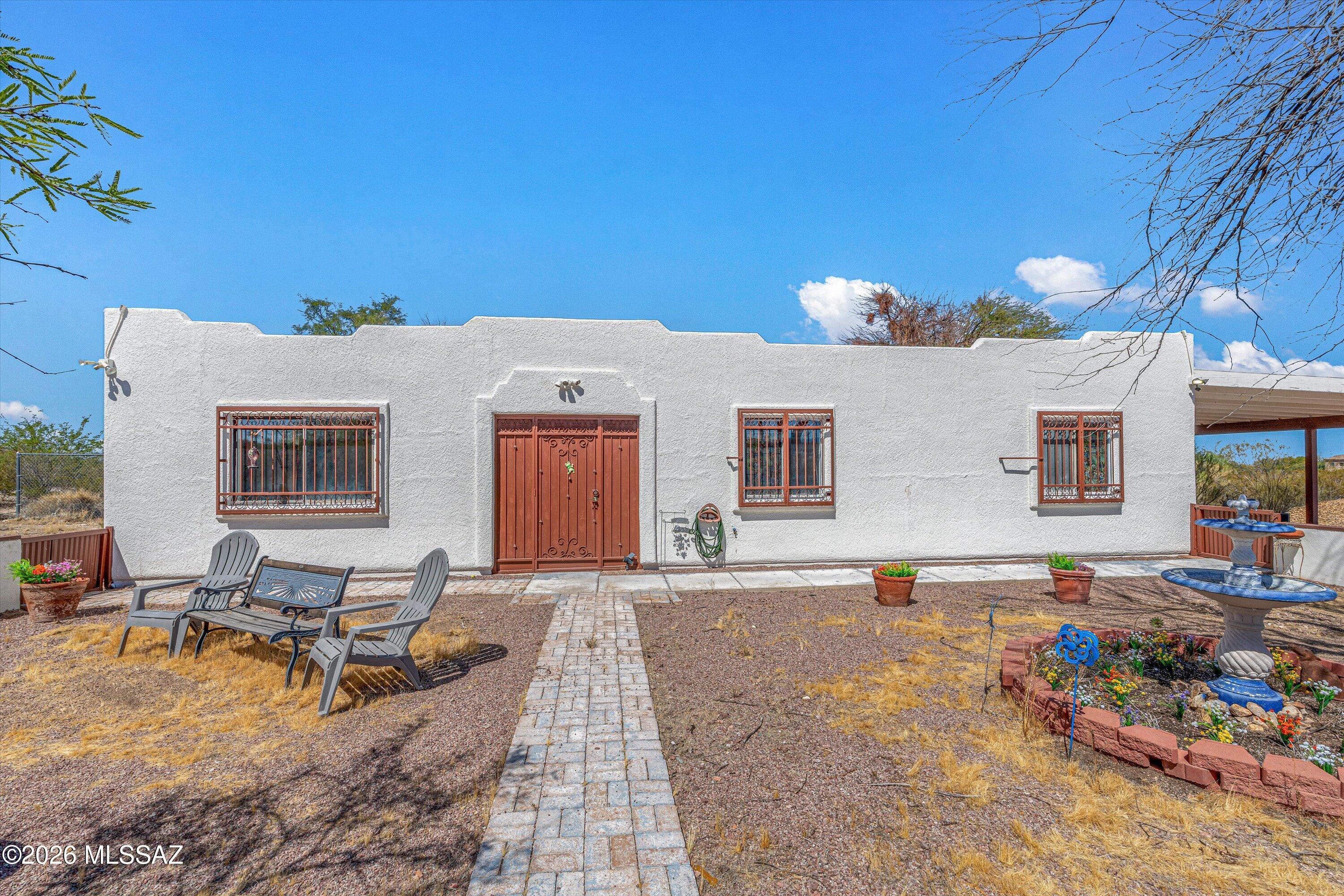 Photos coming! Discover the perfect blend of comfort and country living with this charming 3-bedroom, 2-bath home situated on 4.16 acres of horse property with breathtaking panoramic mountain views. Inside, you'll find an updated kitchen featuring granite countertops.

Enjoy year-round relaxation in the Arizona room or unwind in the private courtyard, ideal for morning coffee or evening sunsets. The fenced backyard provides a secure space for pets, play, or gardening while still offering plenty of room to enjoy the surrounding desert landscape.

With over four acres of usable land, this property offers endless possibilities for horses, outdoor recreation, or creating your dream ranch setup. Whether you're looking for peaceful country living, room to roam, or spectacular Arizona sunsets This property delivers it all.