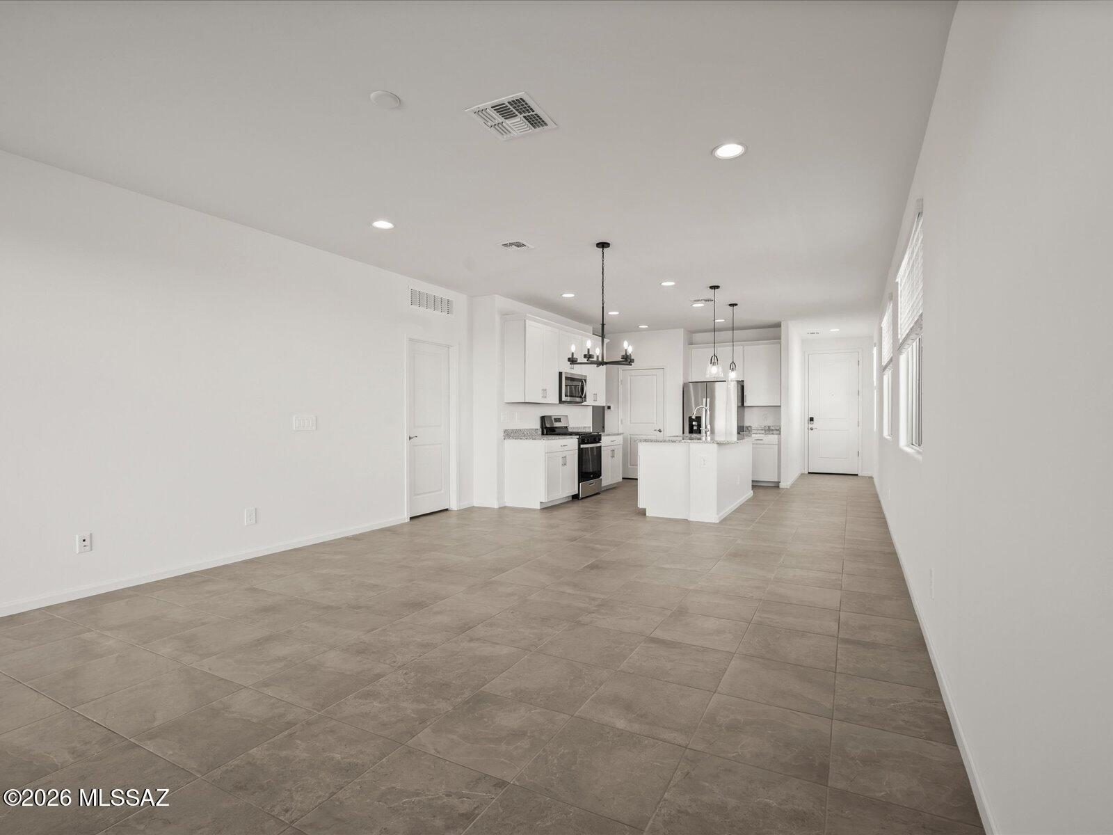 This inviting single-story home offers 4 bedrooms, 2 bathrooms, and plenty of storage throughout. The open-concept design keeps everyone connected, with a spacious kitchen overlooking the great room--perfect for entertaining or everyday living. Discover Sunset Crest, now selling in Ajo and Kinney, where peaceful desert surroundings meet modern convenience. Enjoy community amenities including a playground, picnic areas, shaded ramadas, and gathering spaces designed for connection and relaxation. Built with innovative, energy-efficient features, every home is designed to provide comfort, savings, healthier living, and peace of mind.