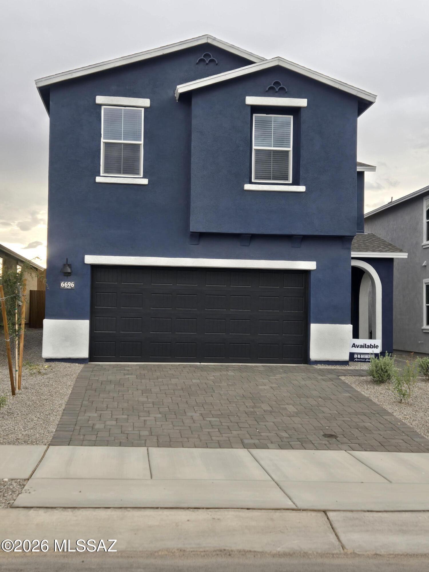 Brand new Construction in Redford estates by D.R. Horton featuring the Gila floor plan. This spacious 2057 sq ft two story home offers 4 bedrooms, 3 full bathrooms, and a 2-car garage. The open concept main floor includes a modern kitchen overlooking the great room, perfect for entertaining. One bedroom and full bath is conveniently located on the first floor, ideal for guests or a home office. Upstairs, enjoy a generous primary suite with walk in closet, plus additional bedrooms and a versatile loft space. Energy-efficient features, contemporary finishes and low maintenance desert landscaping complete this beautiful home. Spray foam insulation and zero energy ready home! Don't miss it!