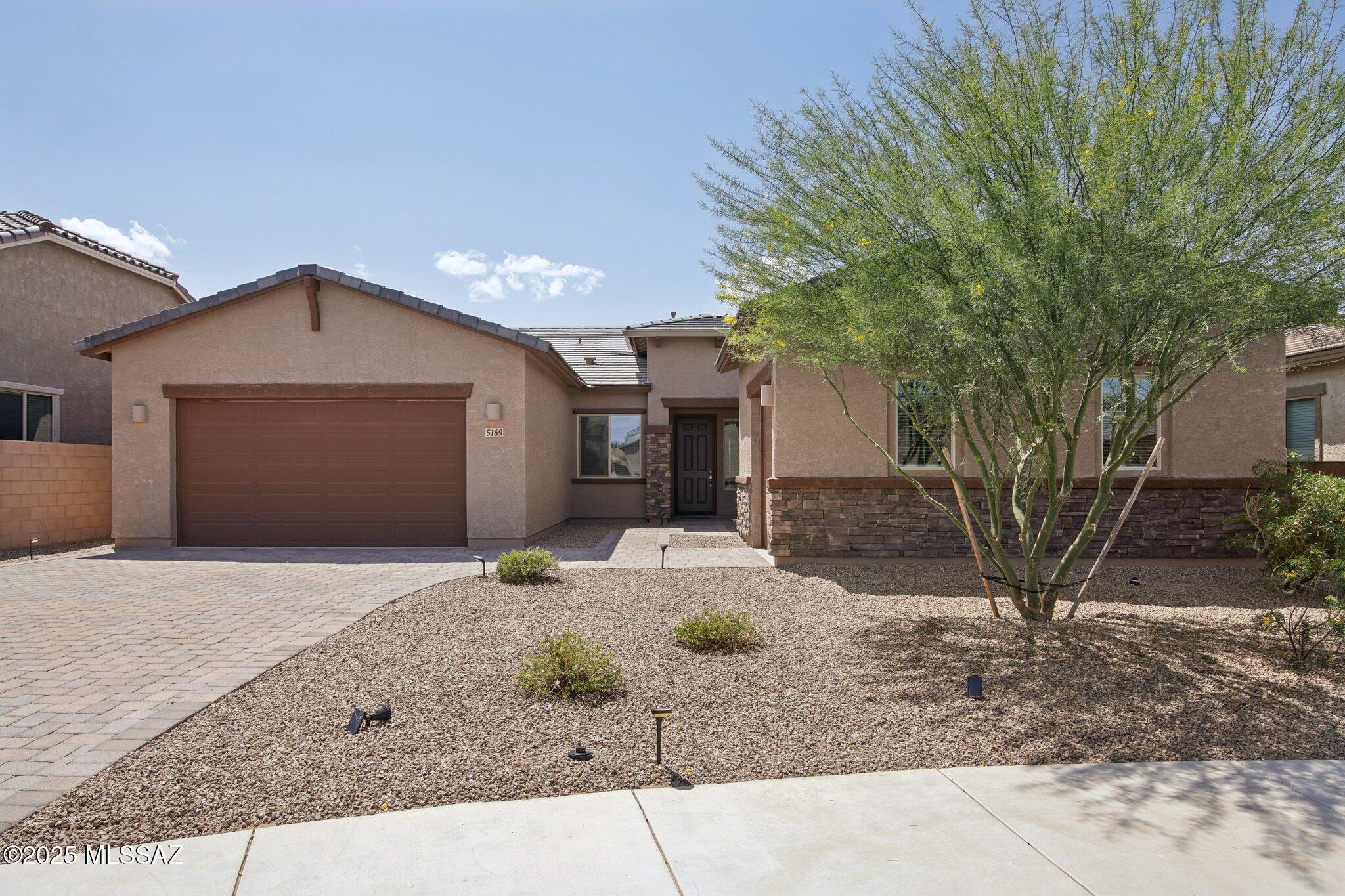 PRICE RANGE $635,000 - $695,000. Live the dream in this magnificent Lennar home in the desirable gated community of Preserve at Twin Peaks! Nestled on a quiet cul-de-sac, this nearly new home boasts an open split floor plan, 2,856 square feet, 4 large bedrooms, including a nice  master bedroom with luxury master bath and his and hers walk-in closets, 2 baths, 2 spacious living areas, a sleek upscale kitchen with quartz counters, 3-car garage, and no immediate rear neighbor. You will appreciate the beautiful curb appeal from the moment you drive up to your paver surface driveway.