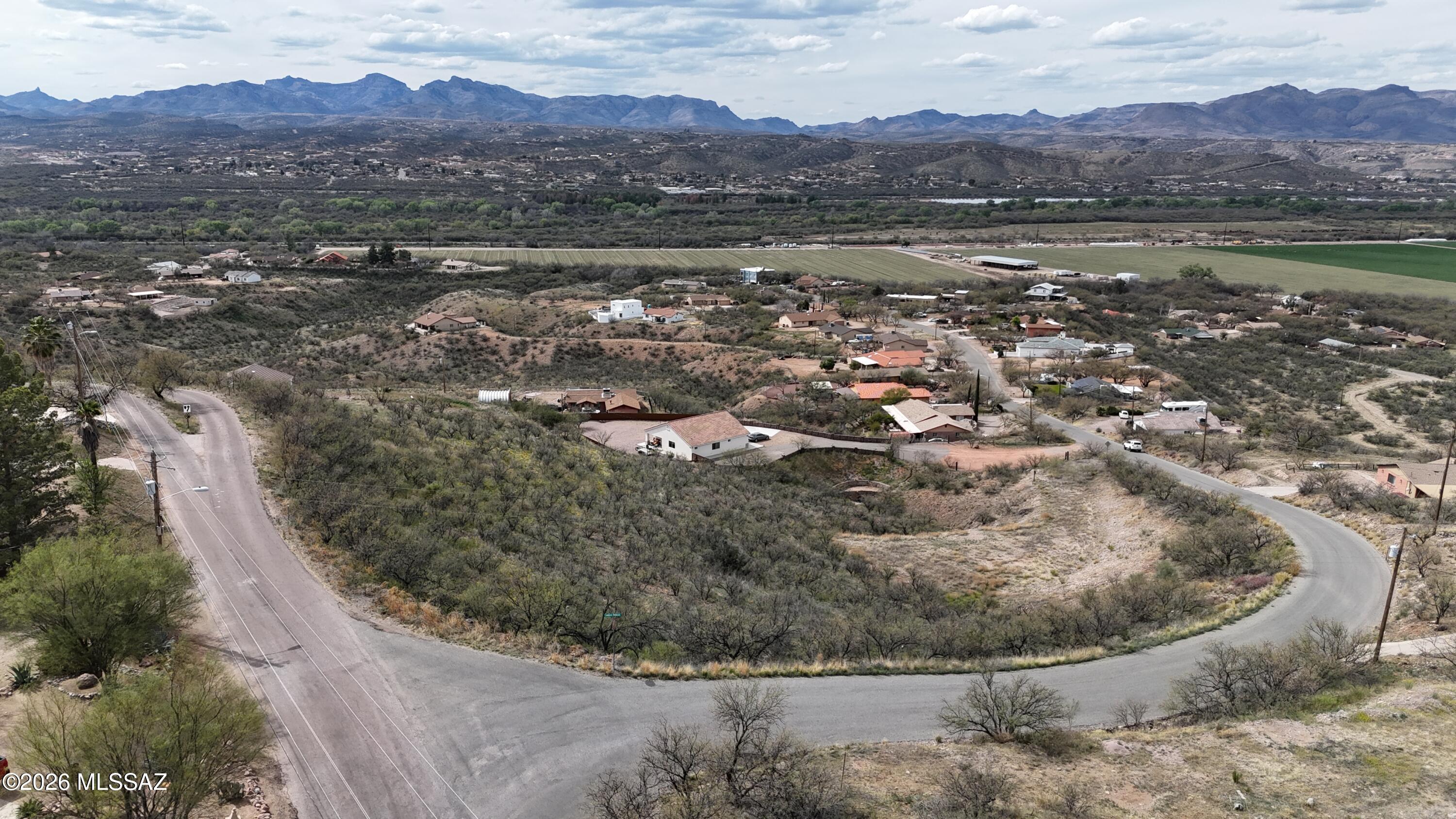 Large lot in bend of the road.  High up views.