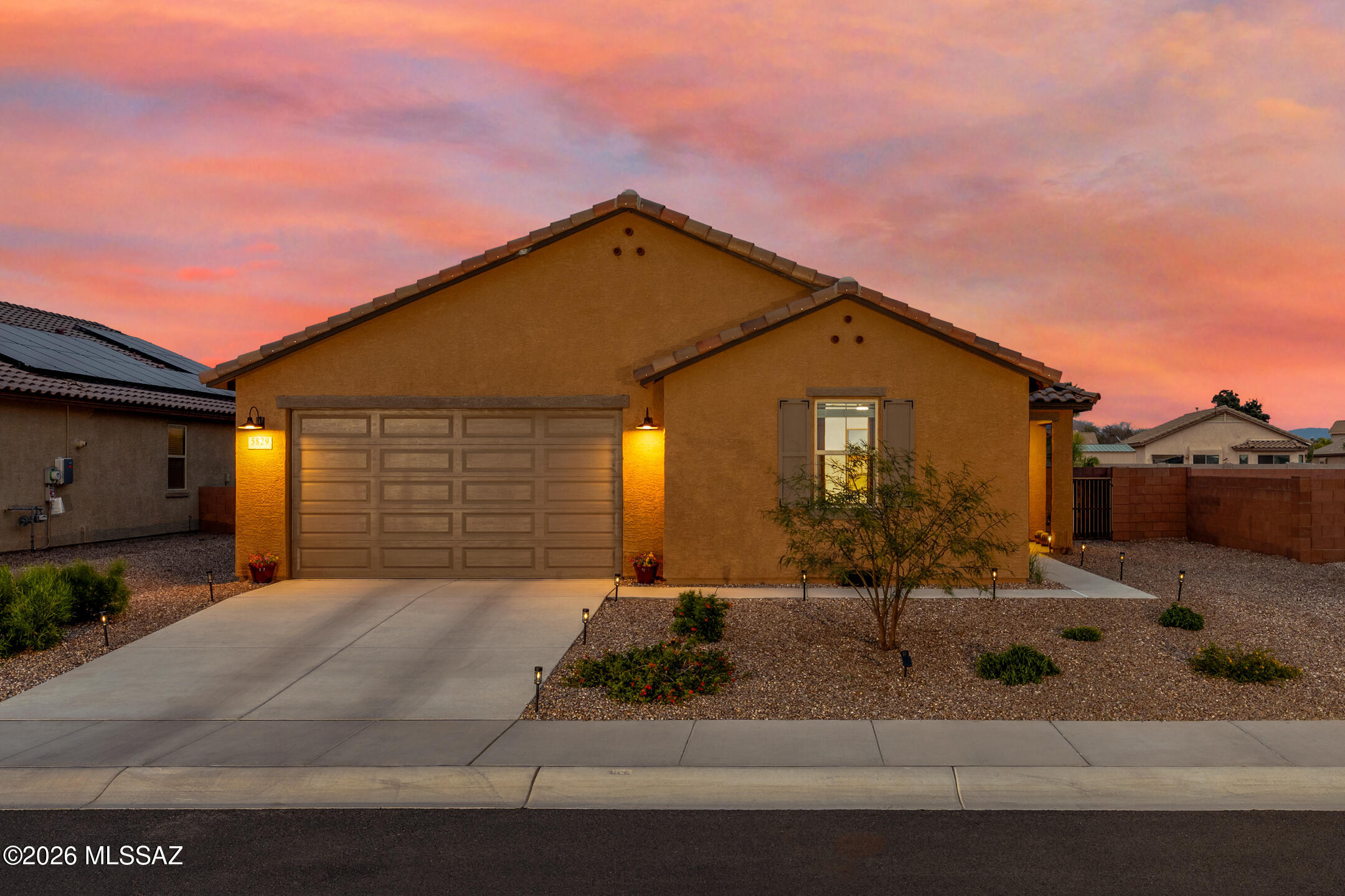 This inviting single-story home offers a bright, open floor plan with 9-foot ceilings and wood-look porcelain tile flooring throughout the main living areas. The modern kitchen is designed for both function and style, featuring granite countertops, maple cabinetry, a large center island, walk-in pantry, and stainless steel appliances. A versatile den provides the perfect space for a home office, flex room, or hobby area.

The primary suite is relaxing, with a walk-in closet and an en-suite bath showcasing dual sinks and a walk-in shower. Two additional bedrooms and a full bathroom offer comfort and flexibility for guests or everyday living. Step outside to the covered patio and enjoy a thoughtfully designed backyard featuring a hot tub, putting green, and stunning mountain views - ideal for entertaining or unwinding. Additional highlights include a tankless water heater and paid solar, offering energy efficiency and long-term savings. Your next chapter starts here!