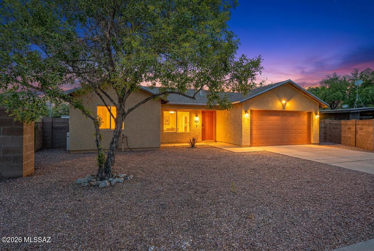 This central Tucson gem is well-maintained and features a bright open living and dining area with French doors to the huge patio with built-in BBQ area, and so many updates! In the last 3 years the roof has been replaced, fresh exterior paint, new garage door and motor, new vinyl plank flooring, new gas range, dishwasher, and microwave. Updated bathrooms. No HOA! Perfectly located near dining, shopping, and everything central Tucson has to offer. Move-in ready and priced to sell!