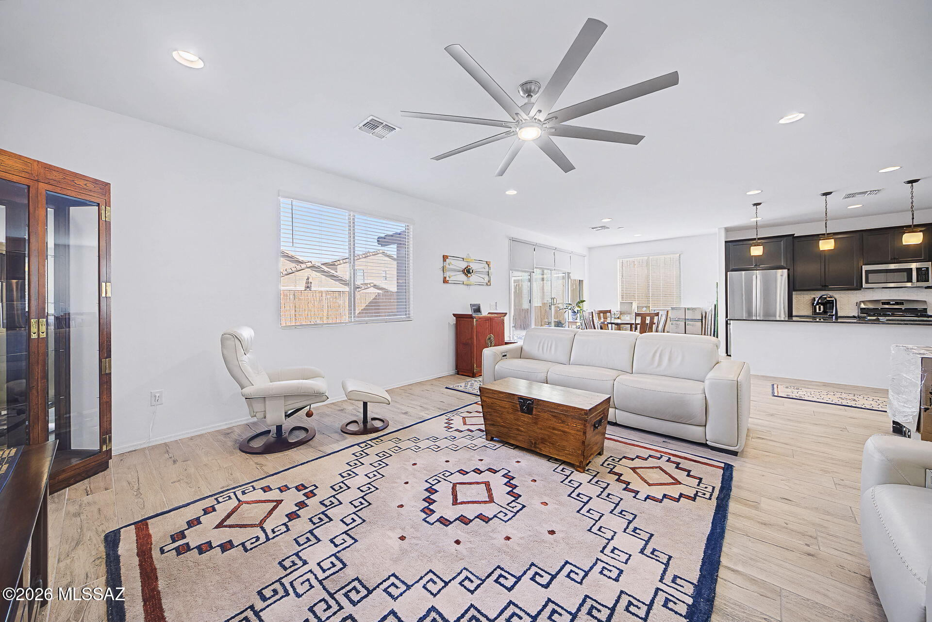 Better than new in sought-after Rancho Sahuarita! Seller will accept or counter offers between $400,000 and $415,000 - w/ buyer's-choice incentive package depending on offer. Move-in ready w/ luxury upgrades and smart savings! OWNED solar delivers major utility savings (current sellers have $0 electric bill for all of 2025). Other home features include water softener, reverse osmosis, wood-look ceramic tile downstairs, matching LVP upstairs, energy-efficient lighting, and a view-rail staircase leading to a loft and 4 spacious bedrooms. Flexible 1st floor bonus room can serve as 5th bedroom or office. Extended 2-car garage and oversized laundry offer added storage. Enjoy a covered patio w/ motorized shades and landscaped backyard with added privacy fencing. Close to pool and other amenities