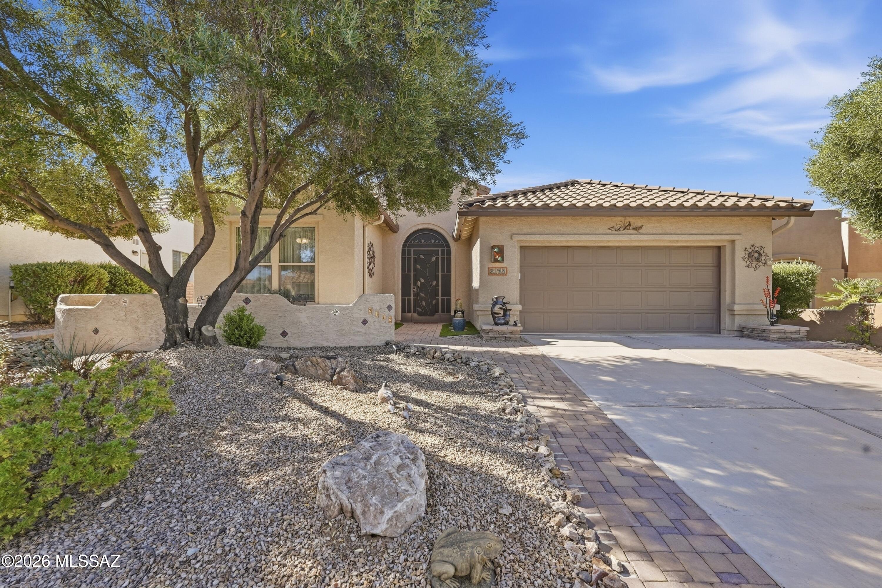 Range Pricing $440,000-460,000. Welcome to this beautifully upgraded home in Quail Creek, offering mountain views, extensive improvements, and an easy move-in-ready lifestyle. The home has been thoughtfully updated throughout, making it stand out from the competition.
Inside, enjoy updated luxury vinyl plank flooring and carpet, 3½-inch baseboards, plantation shutters and Hunter Douglas window coverings, upgraded ceiling fans and lighting, and a solar tube that brings additional natural light into the entry. The kitchen has been enhanced with beadboard detailing at the backsplash and island, along with updated appliances including a gas range, refrigerator, dishwasher and microwave. A Pentair water softener and reverse-osmosis system add everyday convenience. Major improvements include a new HVAC system installed in 2024, updated irrigation and control panel, exterior repainting, gutters and downspouts, full roof underlayment replacement 2018, and a 25-panel solar system helping reduce monthly electric expenses. The garage features a clean epoxy-coated floor, while the front entry is enhanced by a decorative security screen door.
Outdoor living is just as impressive with an inviting front courtyard, professionally landscaped outdoor spaces, expanded back patio, and motorized patio screens that create a comfortable space for enjoying Arizona's beautiful weather and surrounding mountain scenery.
Located in the desirable Quail Creek active-adult community, residents enjoy resort-style pools, fitness facilities, golf, pickleball, tennis, dining, clubs, walking paths and an active social lifestyle. With extensive improvements already completed, this home offers the perfect opportunity to move in and simply enjoy everything Quail Creek has to offer.