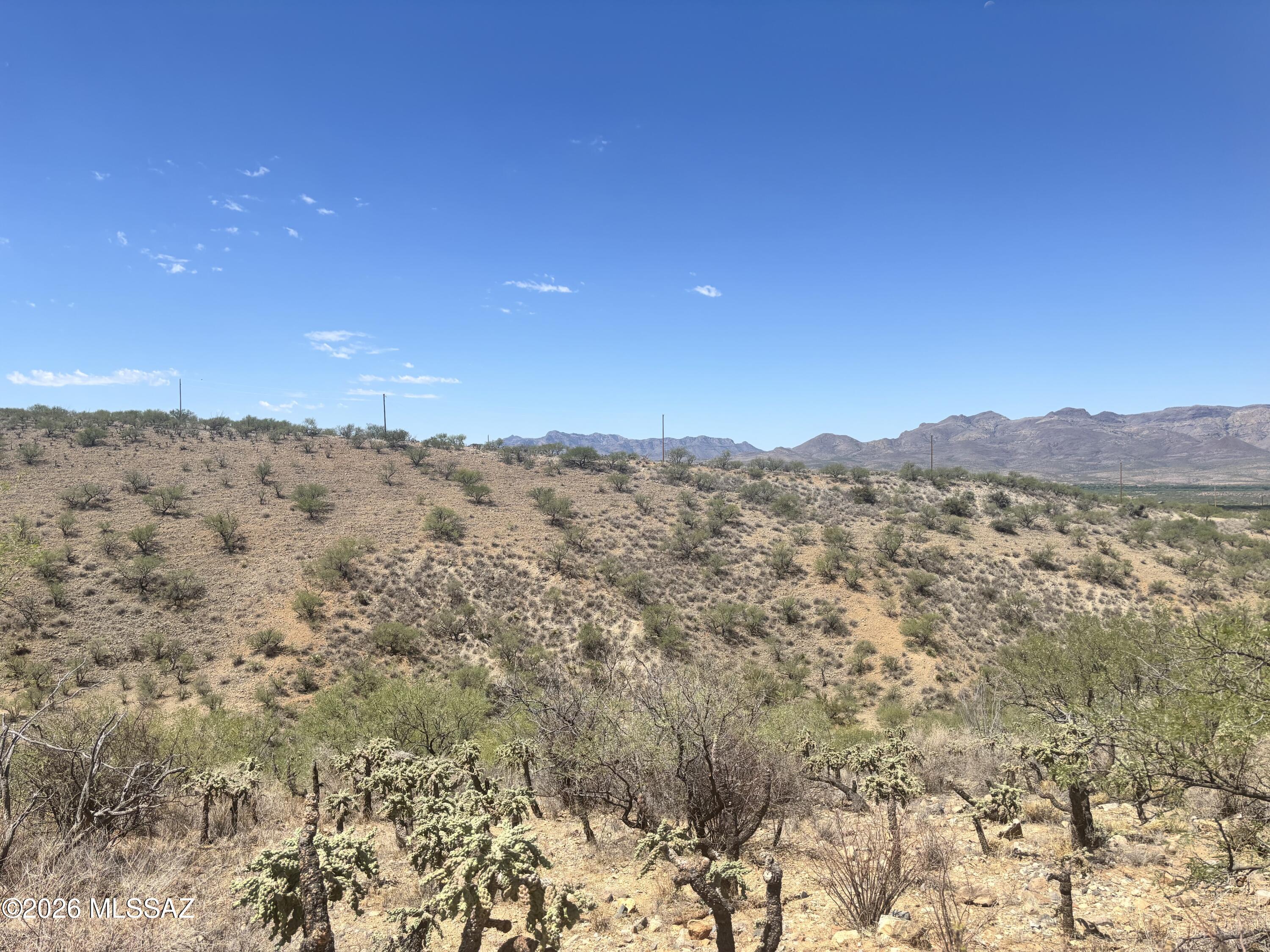 Large parcel - 1.17 acres in Rio Rico.  Beautiful mountain views with utilities nearby.