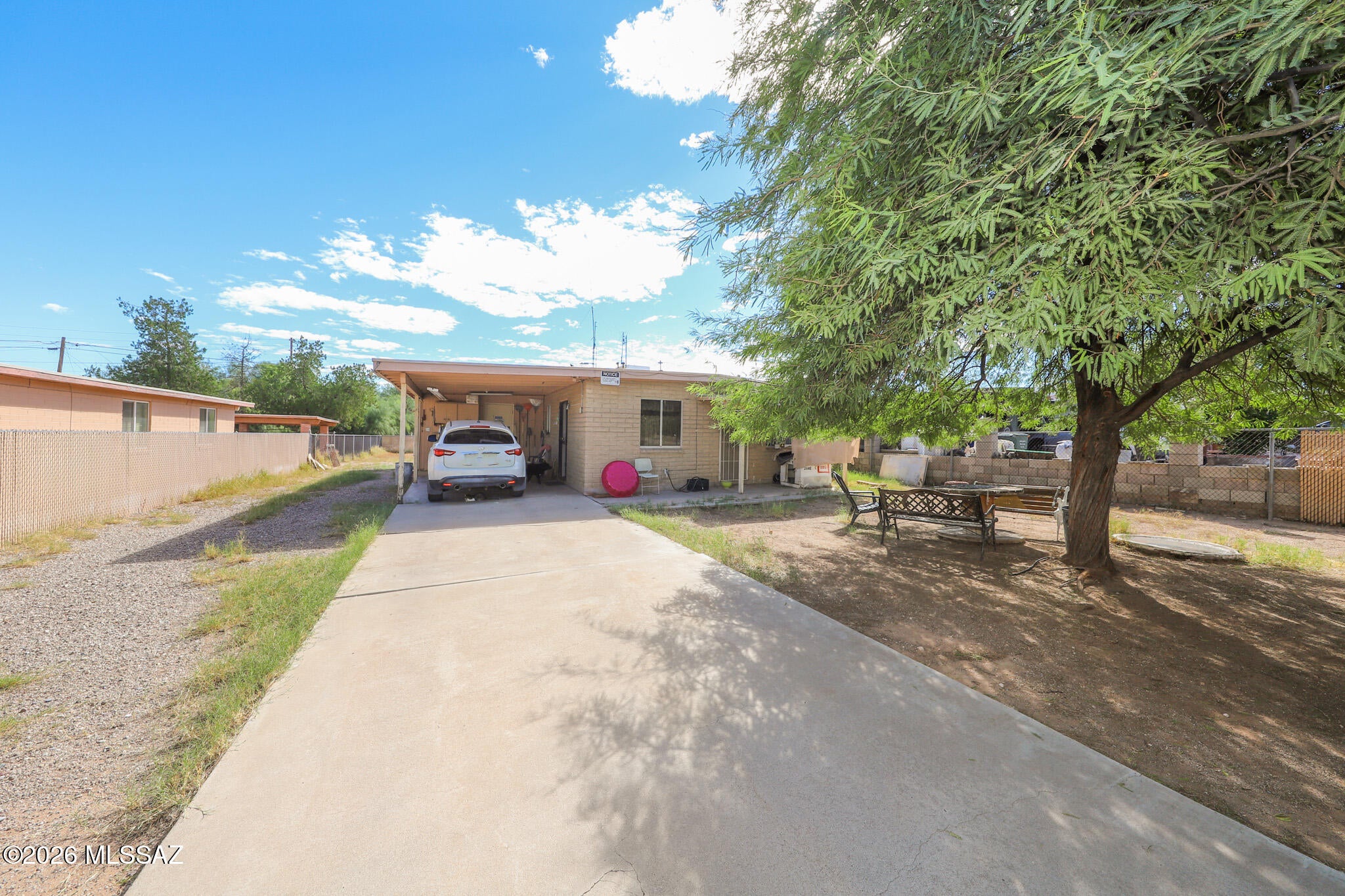Fantastic opportunity for investors, contractors, or buyers looking to bring their vision to life! This 4 BR/2 BA home offers 1,255 square feet of living space on a generously sized lot. Vinyl plank flooring runs throughout most of the home, with the exception of two bedrooms. Two new mini-split systems in the primary bedroom & living room provide added comfort. A spacious storage & laundry room adds functionality, while the impressive detached 40' x 40' garage offers endless possibilities for vehicles, a workshop, hobbies, or additional storage. With the potential for a second dwelling unit, this property offers exciting opportunities for multi-generational living, rental income, or future expansion. Being sold AS IS, this property is ready for someone to unlock its full potential!