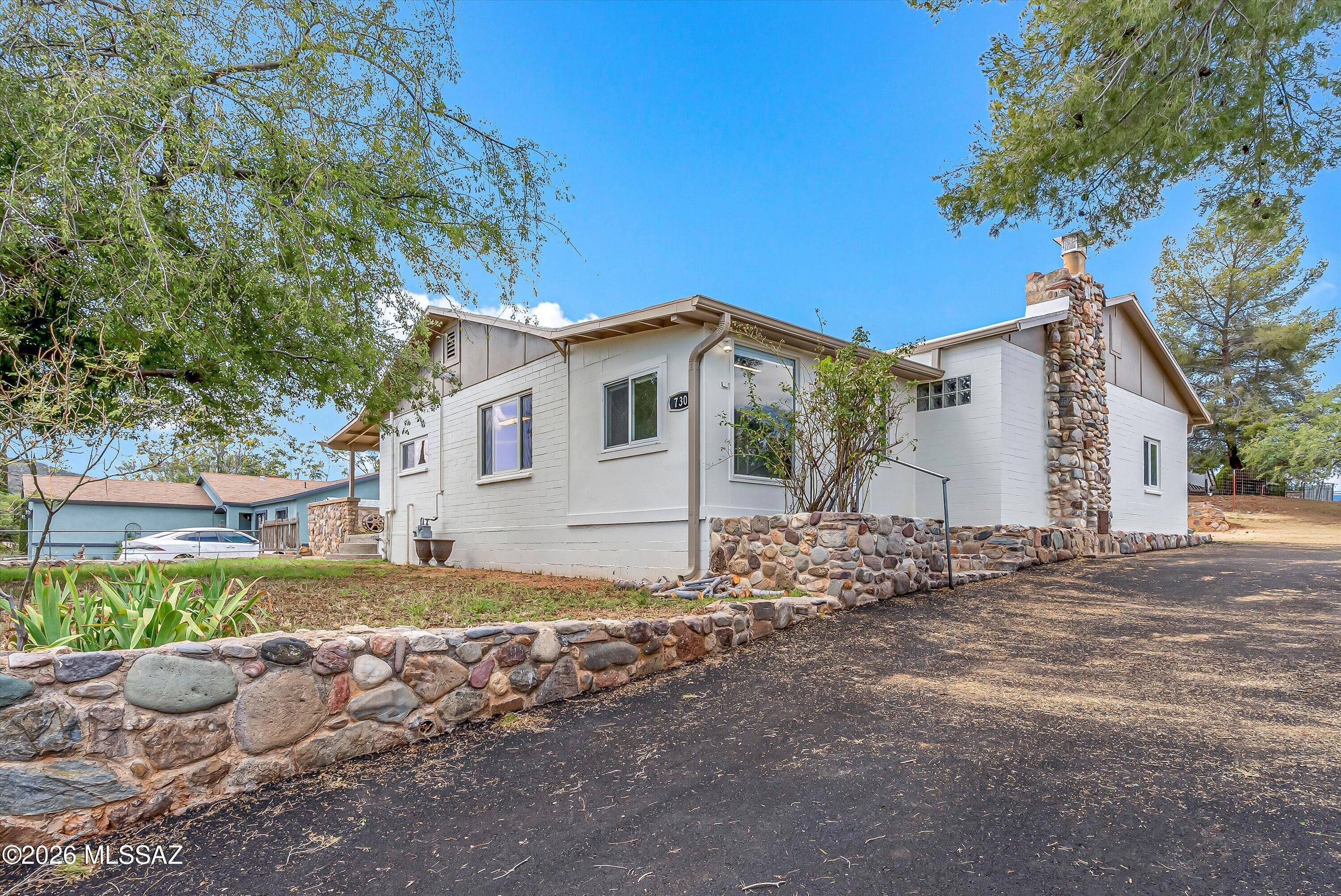 This beautifully remodeled and spacious 3-bedroom, 1-bathroom home with central A/C and is move-in ready! The stylish kitchen features updated cabinetry and premium stainless steel appliances, including a refrigerator, gas range, microwave, and dishwasher. Additional features include dual-pane windows, ceiling fans, a cozy fireplace, luxury vinyl plank and tile flooring throughout, an enclosed laundry room with a washer, dryer, and extra storage space, plus a spacious Arizona room that offers added versatility. The fully remodeled bathroom features a tiled tub/shower combination, a dual-sink vanity, and an updated mirror.
Enjoy elevated mountain views from the front yard. Tenant is responsible for all utilities, including trash service.
