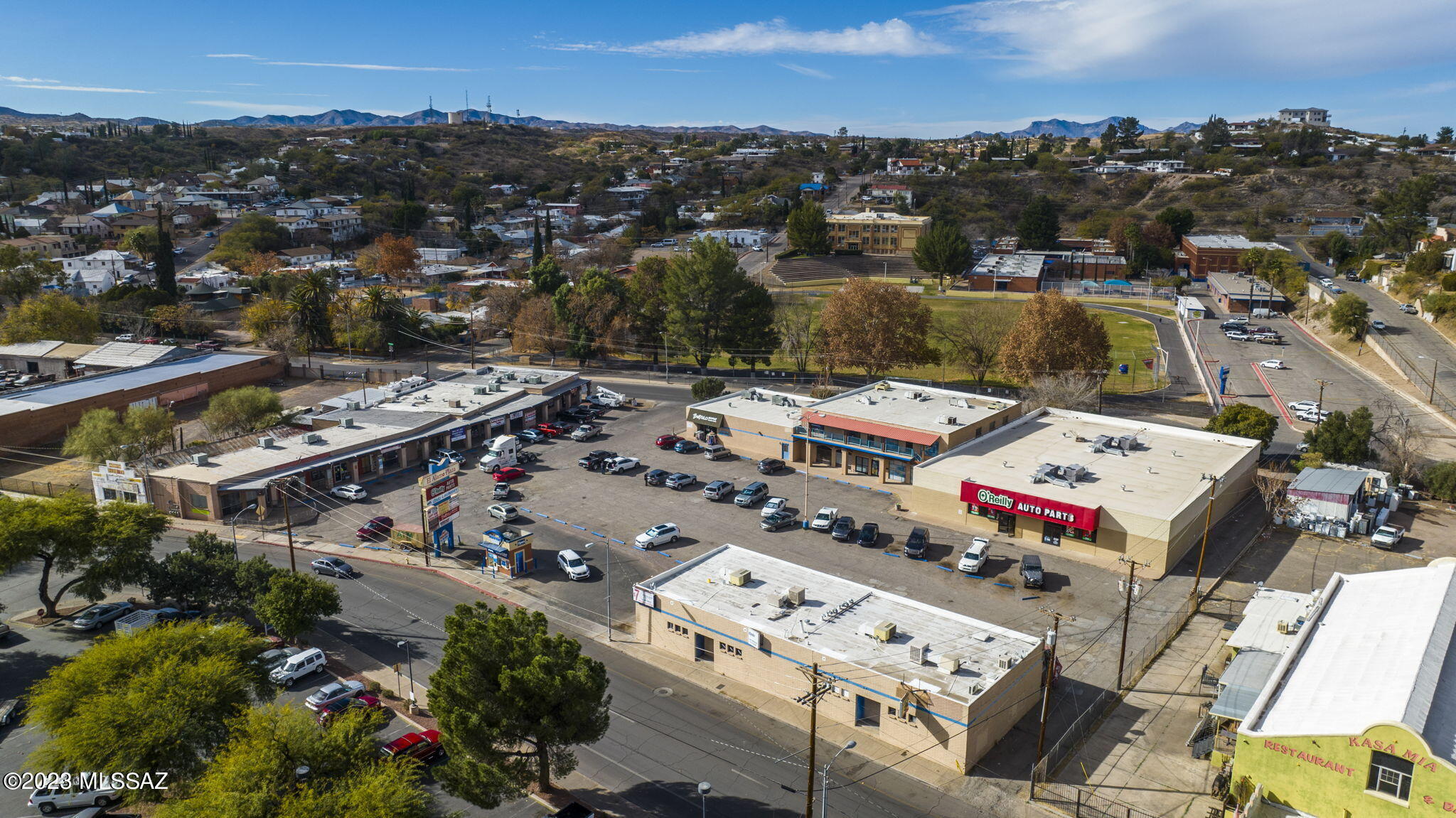 Phenomenal investment opportunity to own the coveted El Alamo Plaza, a well-established retail and office commercial center located on a huge 2.06-acre lot in the heart of downtown Nogales! Located approximately 0.45 of a mile north of the international border, the plaza can be accessed by heading south on N. Grand Avenue (on way to Mexico) or by heading north on N. Arroyo Blvd (as leave Mexico). The property comprises 21 income producing units spread out over 37,482 square feet boasting 16 retail spaces, one big box retail, three office spaces, and one stand-alone hub. Established tenants include O'Reilly Auto Parts, Buffalo Exchange, PostNet Postal Service, Anda Laundry Mat, Dorado Staffing Services, Futuro Insurance, Medicare Community Resource Center, Mining Supplies,