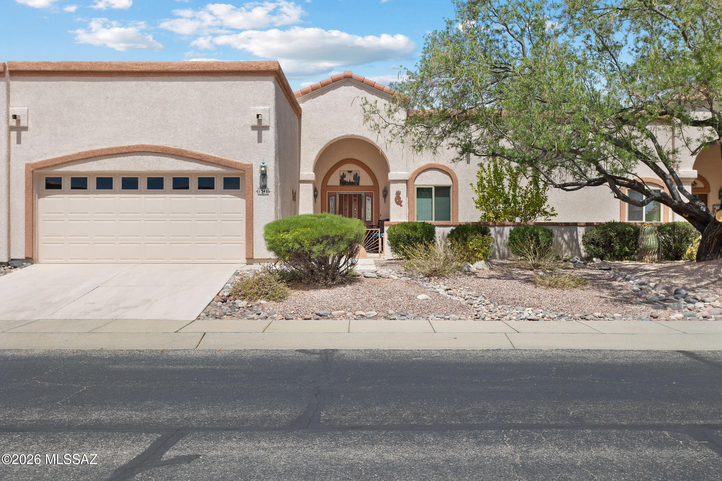 This Unfurnished 3-bedroom, 2.5-bath rental in Oro Valley is ready for you to move in and make it your own. It was built by Steve Solomon with solid 2x6 construction, and the interior has brand-new paint throughout. Tile floors run through the main living areas and lead to a spacious kitchen with granite countertops and plenty of cabinet space. Built-in niches in the primary bath and powder room add both style and function.

The garage has built-in shelving and a workbench, so there's room for storage, hobbies, or weekend projects. Outside, you can relax in the private front courtyard or enjoy the landscaped backyard.

You'll be close to top-tier golf, dining, and shopping. Schedule your showing today!