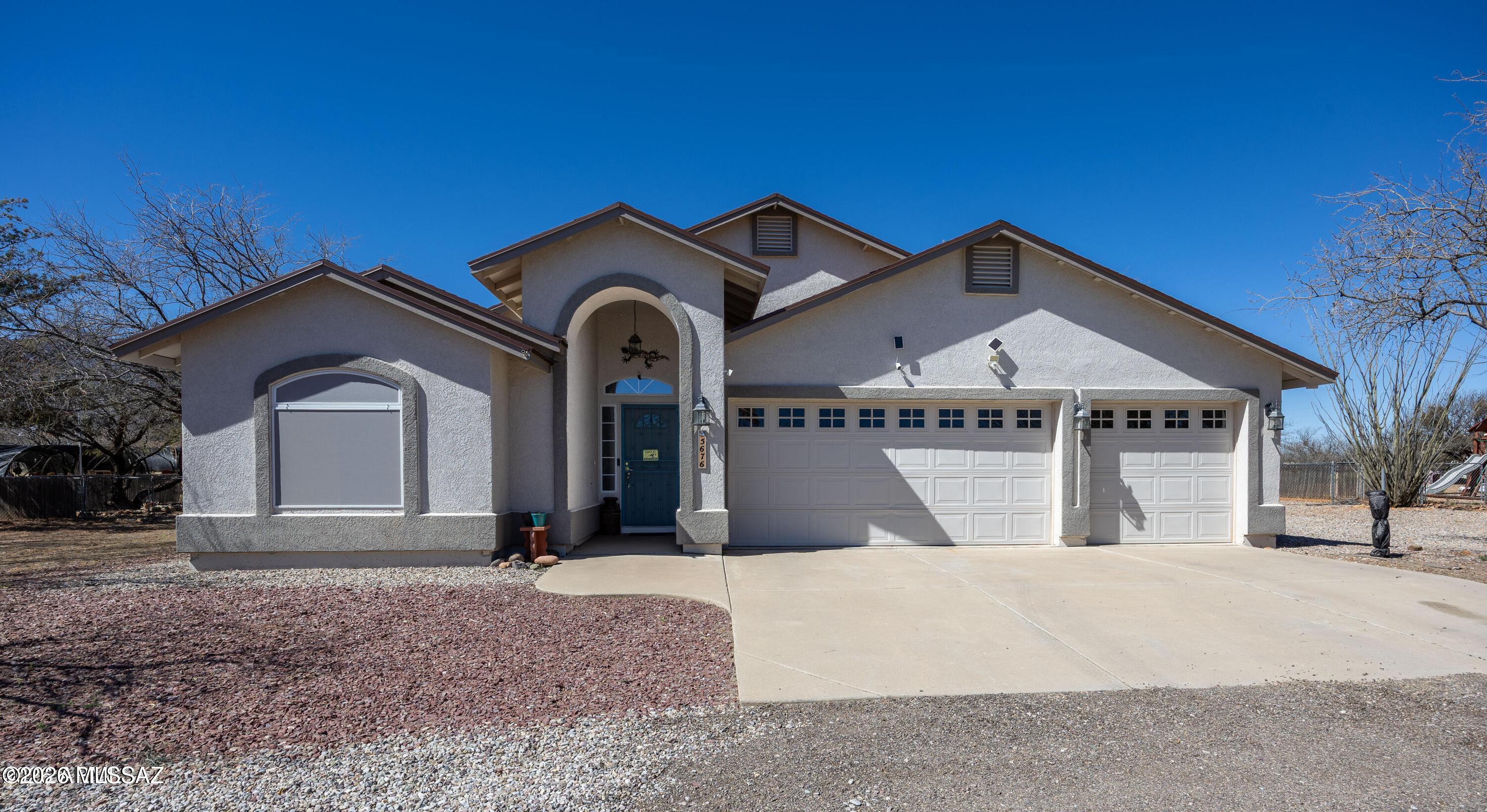 Assumable 6.25% VA loan! Situated on more than 1 acre of horse property on a peaceful cul-de-sac, this extensively updated home showcases stunning mountain views, outstanding seclusion, and an incredible opportunity to experience the best of Hereford/Sierra Vista living. Ideally located just minutes from Ft. Huachuca, the property is also close to some of the area's renowned birdwatching destinations, creating the perfect setting for outdoor recreation and nature enthusiasts. An additional advantage is the sought-after VA assumable loan available to qualified buyers. Carefully improved and truly turnkey, the home includes a new roof (Jan 2025), fresh interior and exterior paint (March 2025), and an expansive Arizona room completed in Fall 2024 featuring its own dedicated mini split for all-season comfort Inside, dramatic vaulted ceilings and a well-designed split floor plan provide a bright, welcoming feel, accented by stylish granite countertops throughout.
The generous primary suite offers a relaxing escape with a dual-sink vanity, oversized soaking tub, separate shower, and a large walk-in closet. Outdoors, the easy-care backyard is ideal for both unwinding and entertaining, complete with artificial turf, a serene new fishpond, and gated access to the rear acreage--perfect for horses, RV parking, trailers, or future possibilities.
Additional features include a 3-car garage, a large wooden storage shed with dual-gate access, and a full Arlo security system. Blending contemporary upgrades, horse property versatility, scenic surroundings, and convenient access to Ft. Huachuca, this property offers an exceptional lifestyle opportunity.